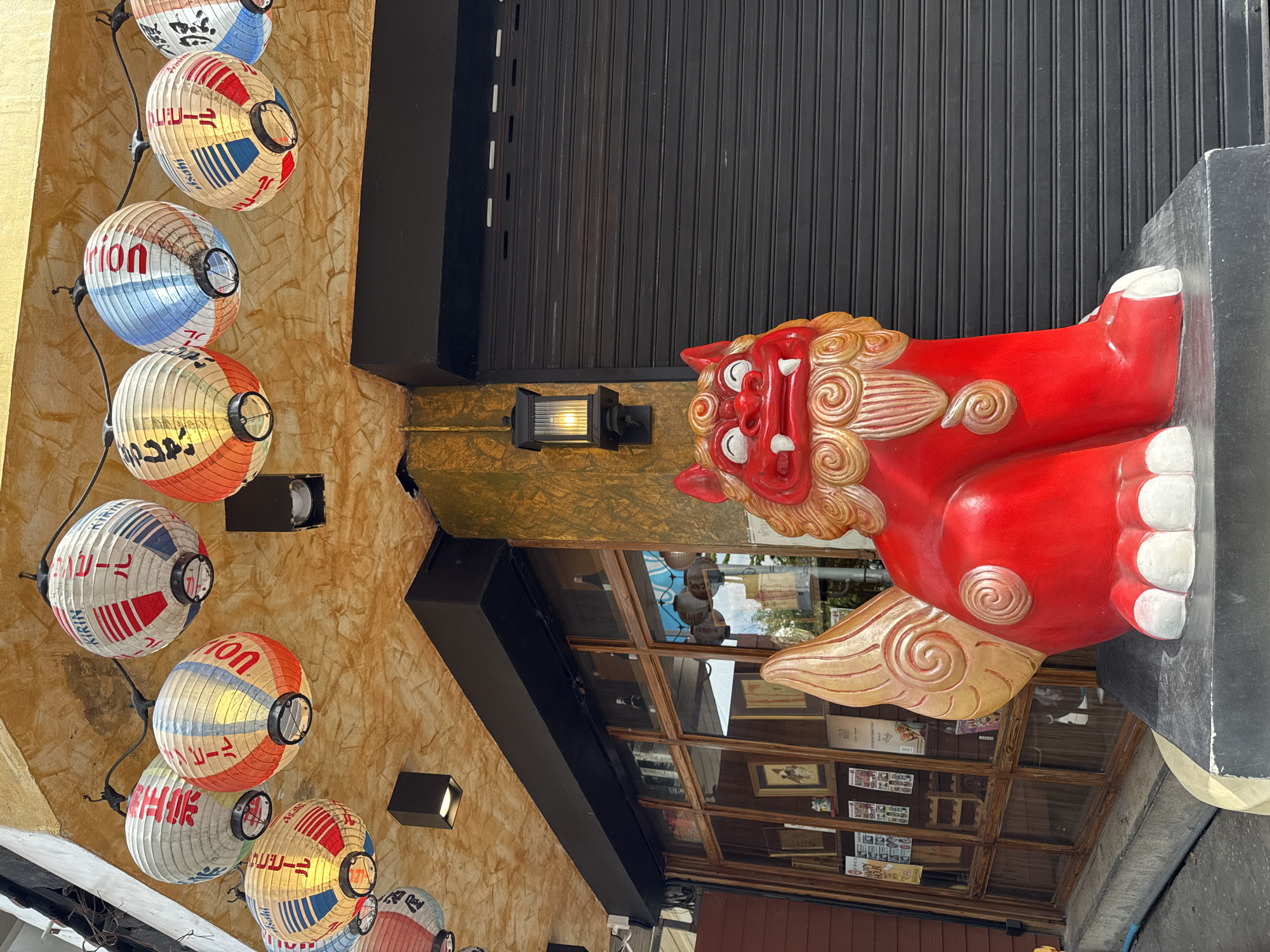 Chinese lion statue spotted outside Bangkok shop