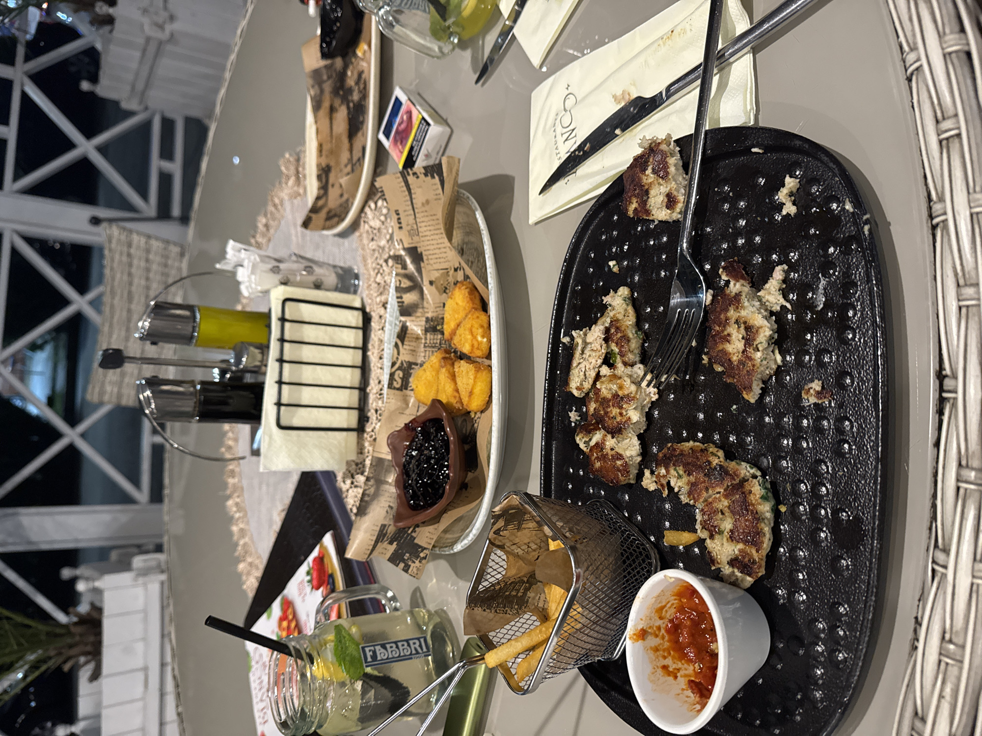 Evening dinner documented with cat and vintage photo in Bulgaria