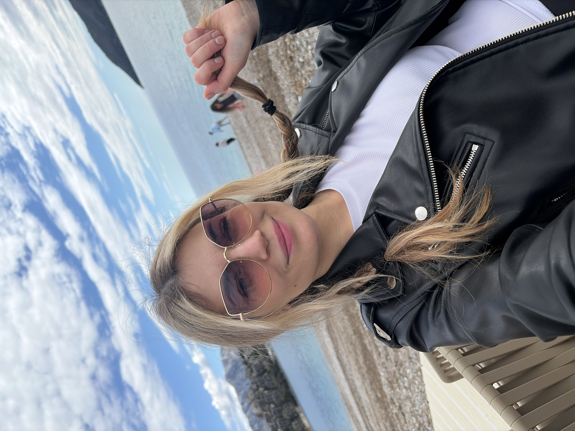 Couple enjoys beachside cafe visit in Budva, Montenegro