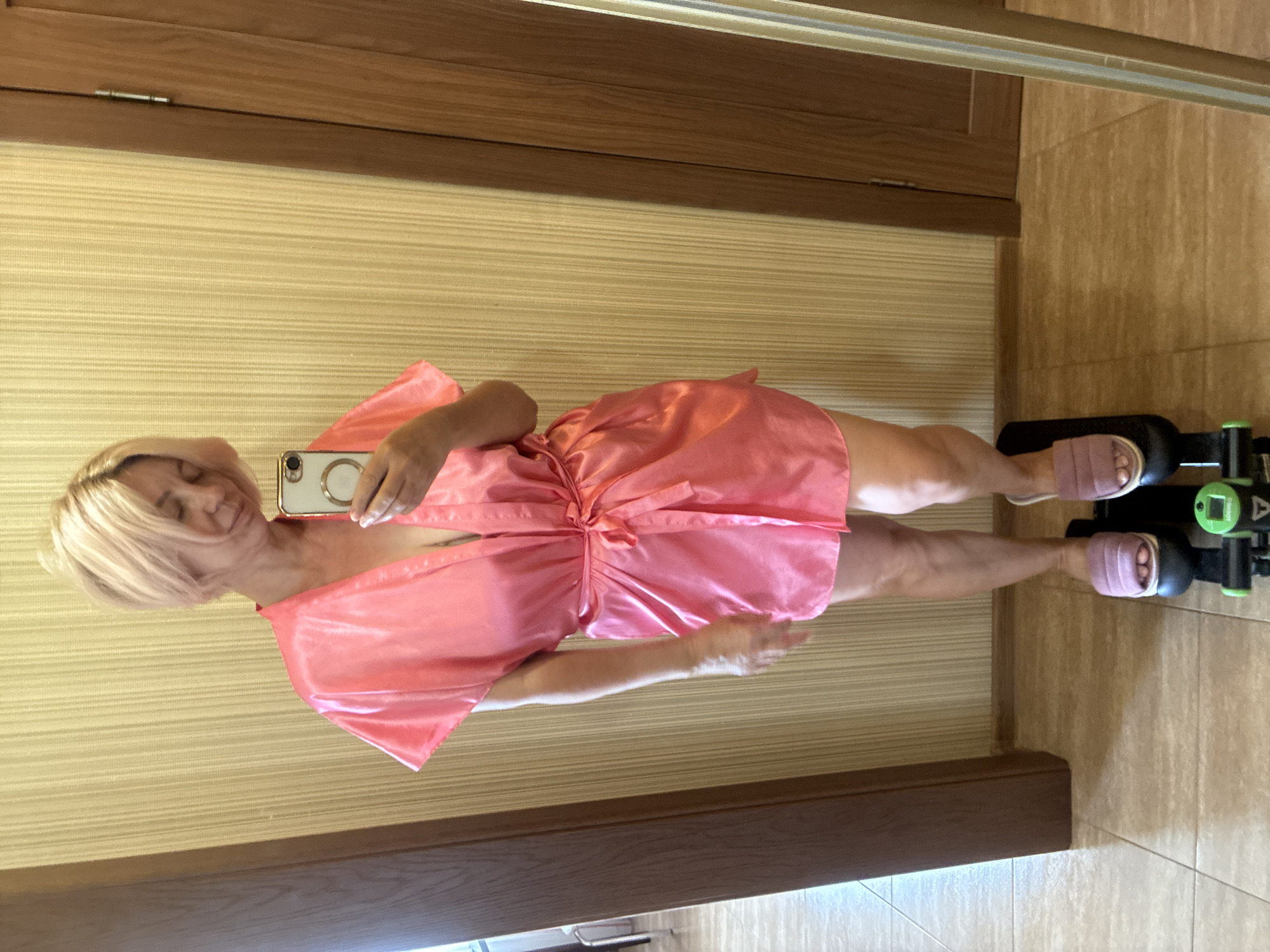 Morning selfies in a pink robe, Sochi balcony backdrop