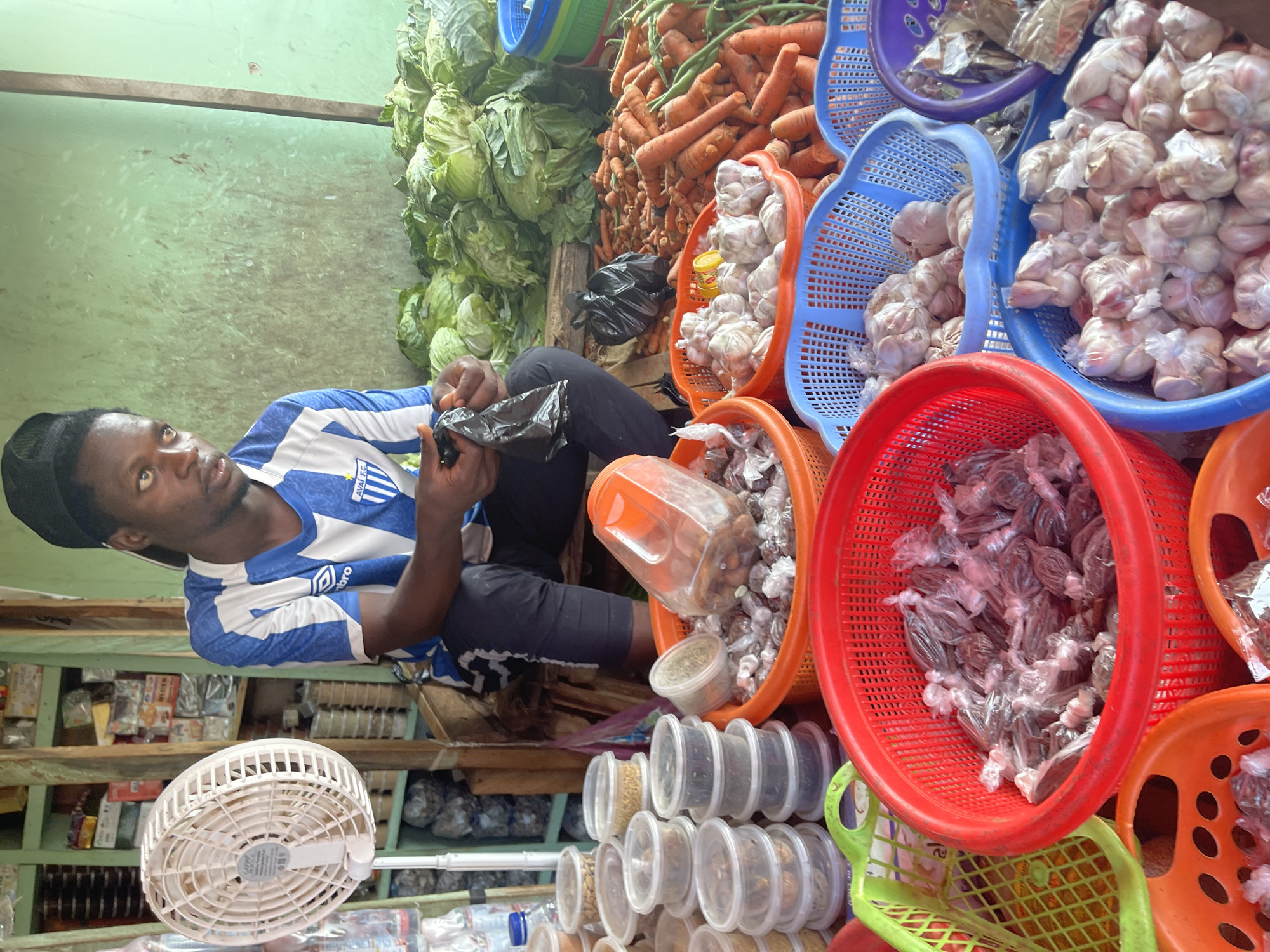 Market vendors conduct afternoon business in Akwanga, Nigeria