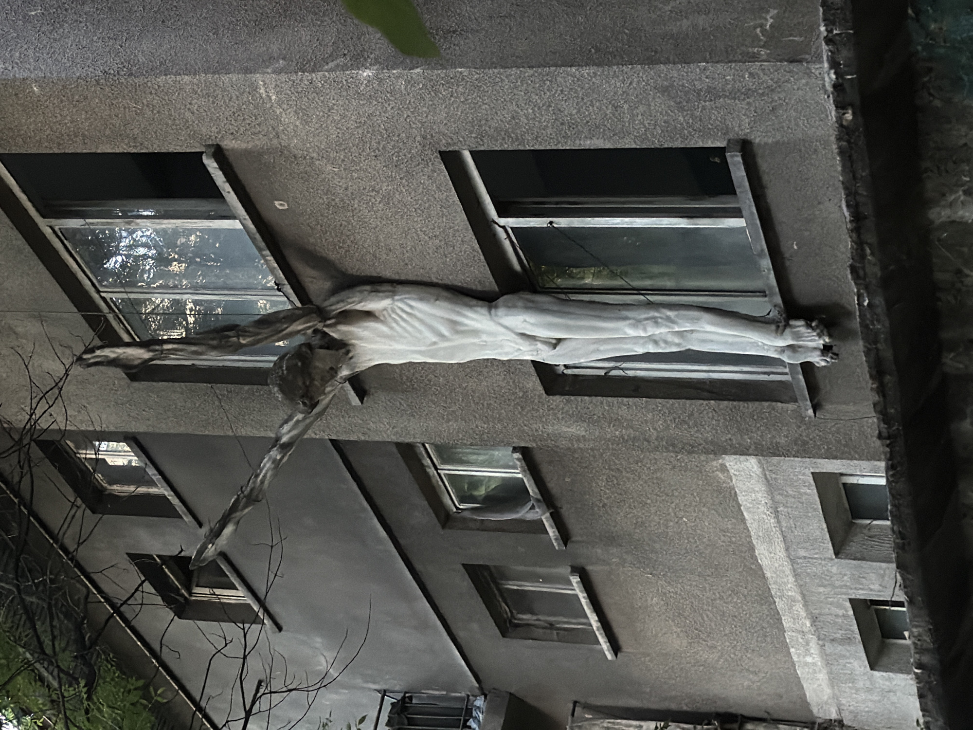 Crucifixion sculpture mounted on Sofia apartment building draws attention