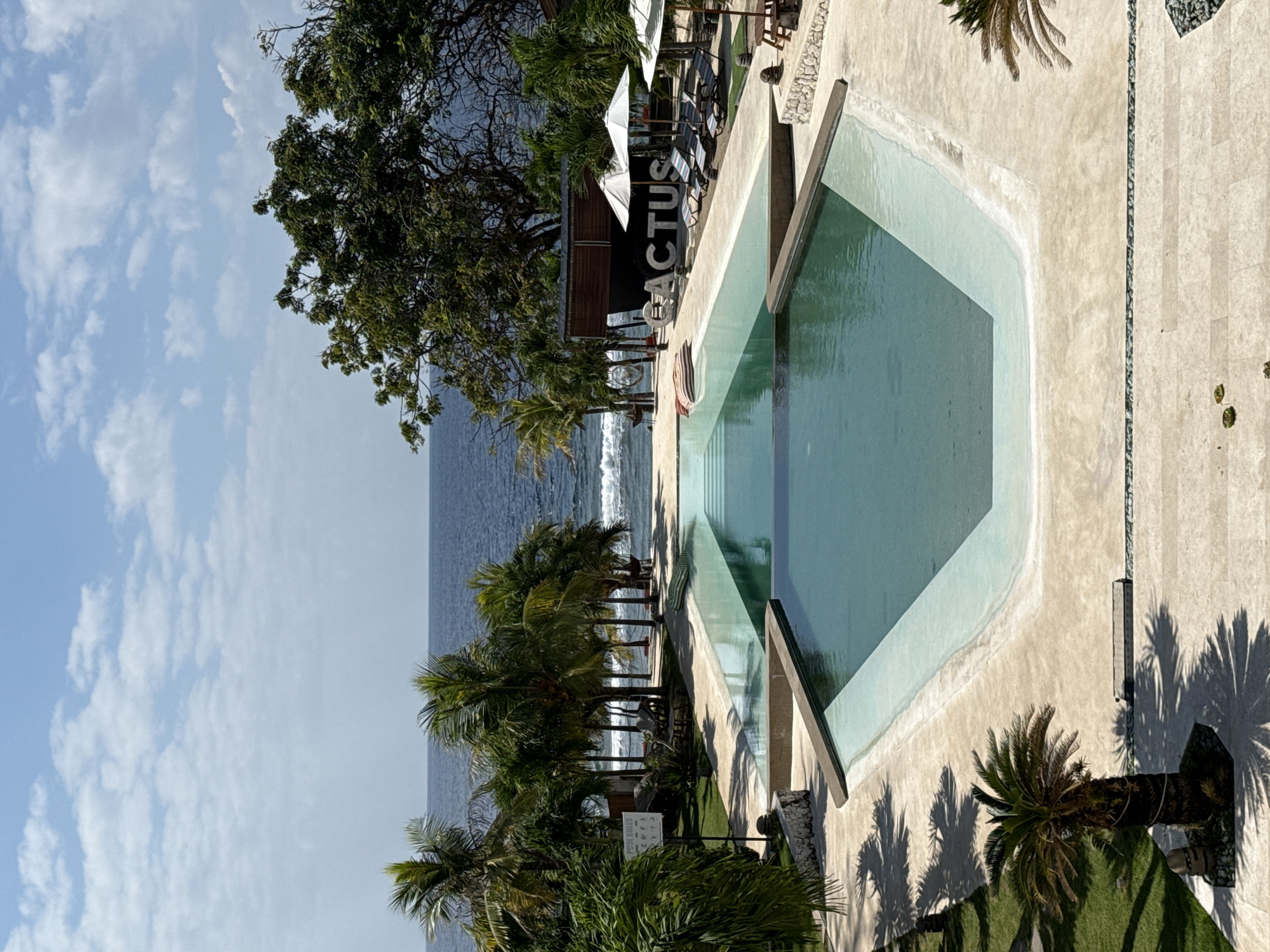 Poolside and café scenes at a Nusa Penida resort