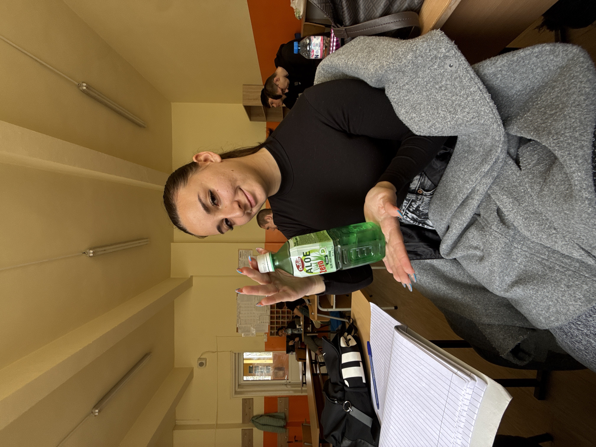 Student displays aloe drinks in Sofia classroom Tuesday morning