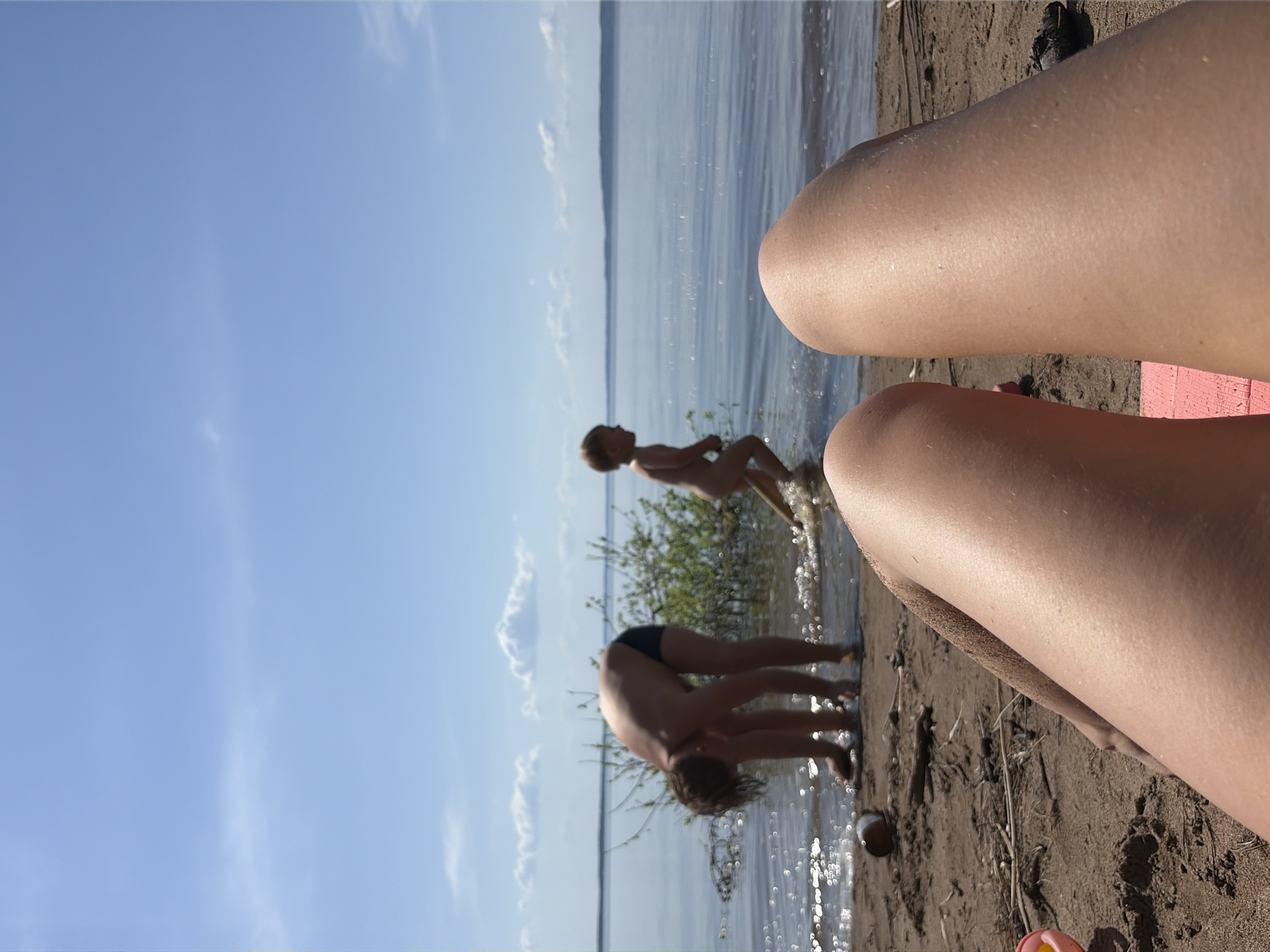 Beachgoers enjoy sunny day in Vekoshinka, Russia