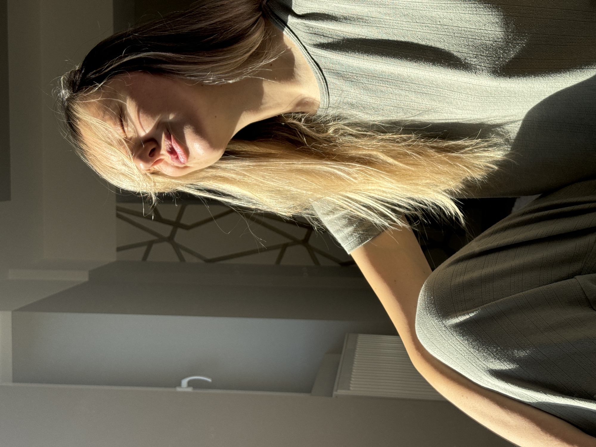Woman photographs morning routine indoors and outdoors in Carnikava