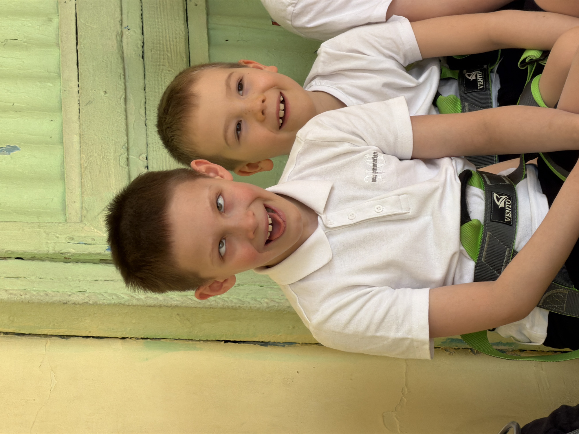 Children participate in indoor rock climbing activity in Izhevsk