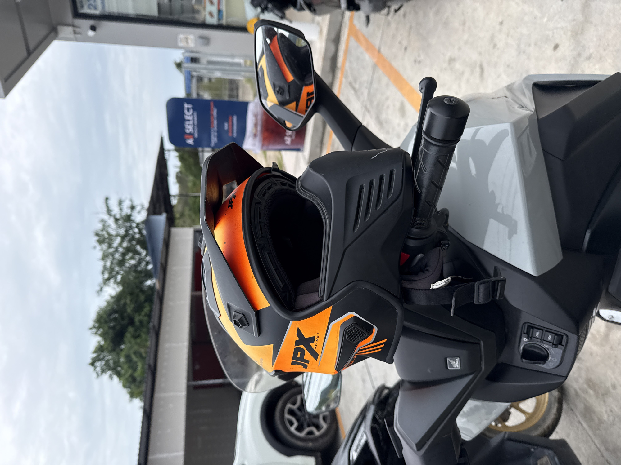 Morning stop at a Ko Samui 7-Eleven, delivery bike out front