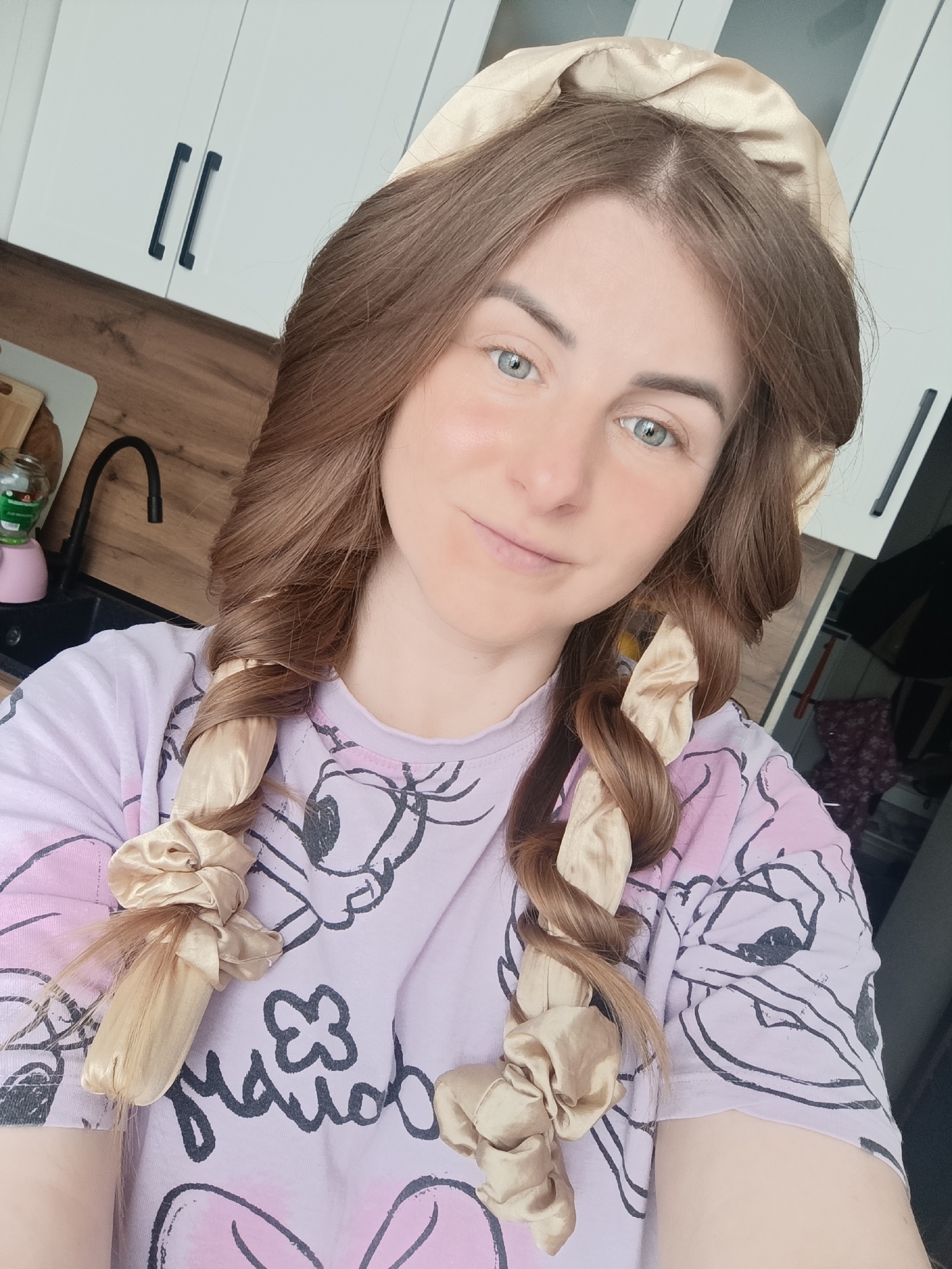 Woman takes selfie in kitchen in Chernogolovka, Russia