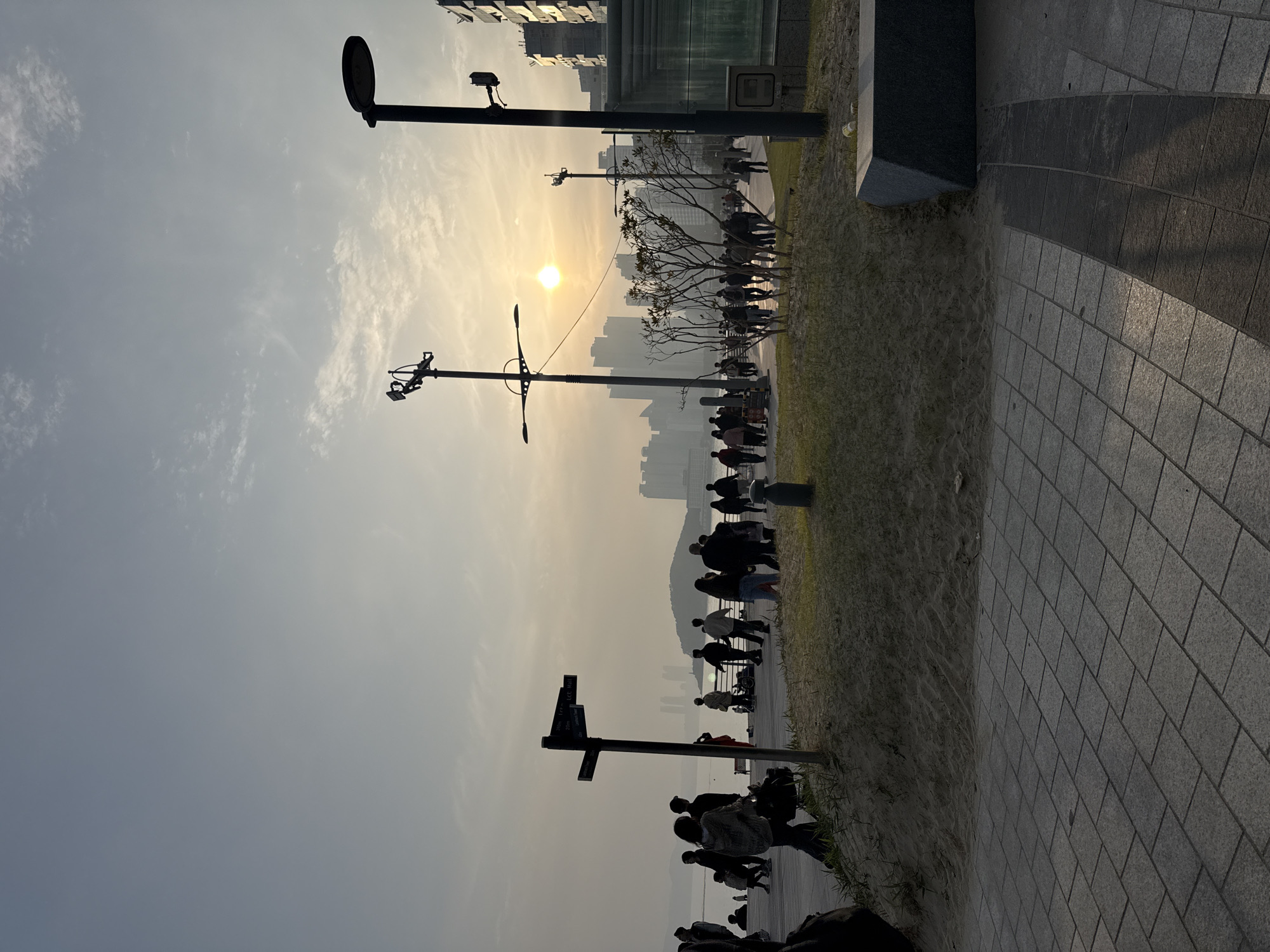 Evening waterfront activity and currency exchange in Busan