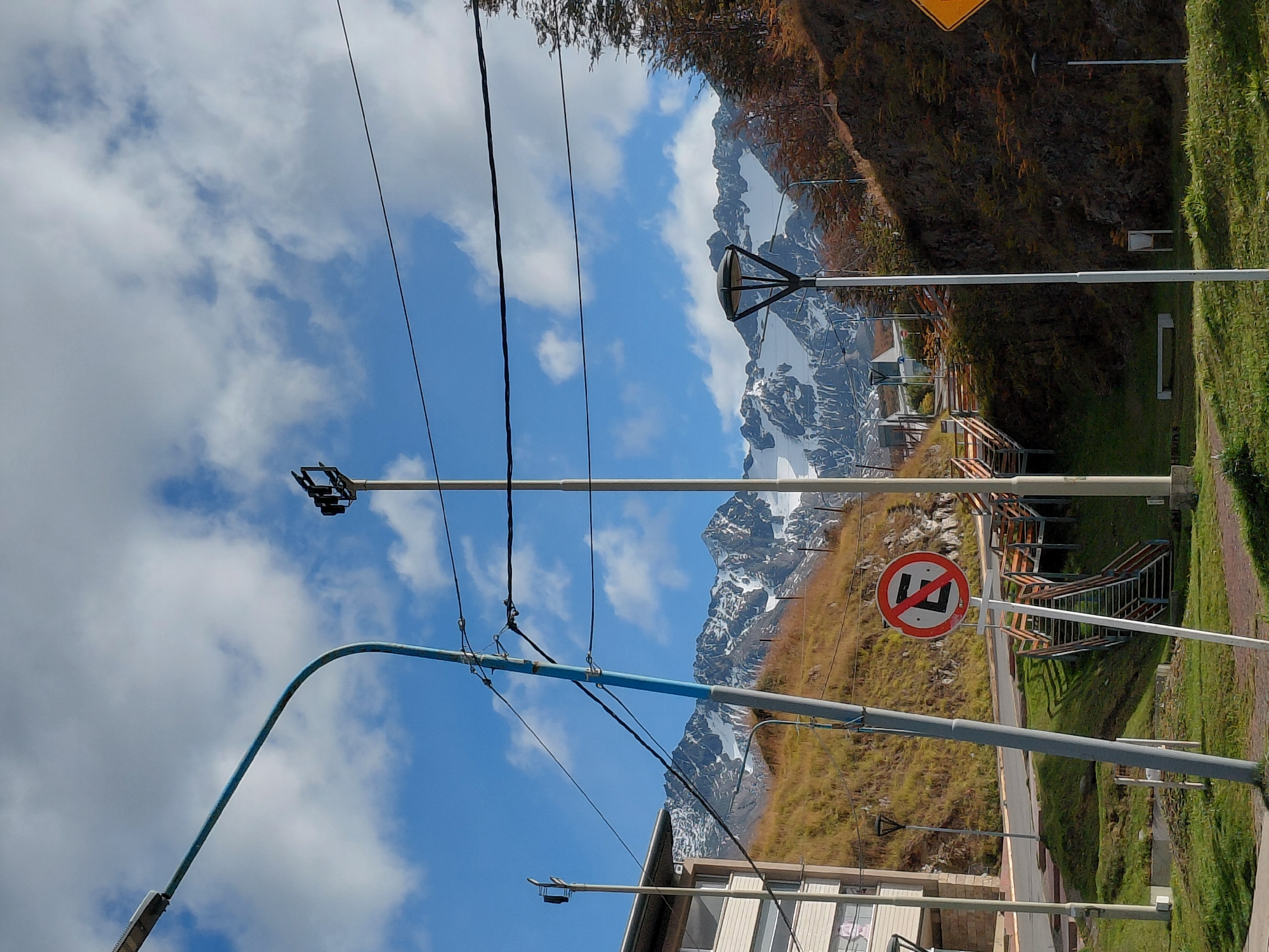 Mountain landscape viewed through power lines in Ushuaia, Argentina