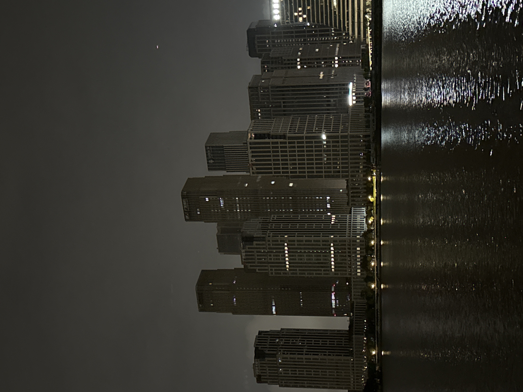 Nighttime stroll along Haizhu's illuminated Pearl River waterfront
