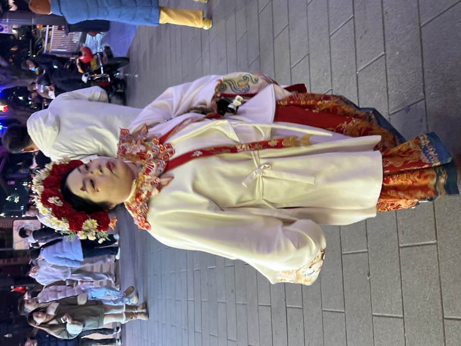 Traditional dress photo session in nighttime Chongqing district