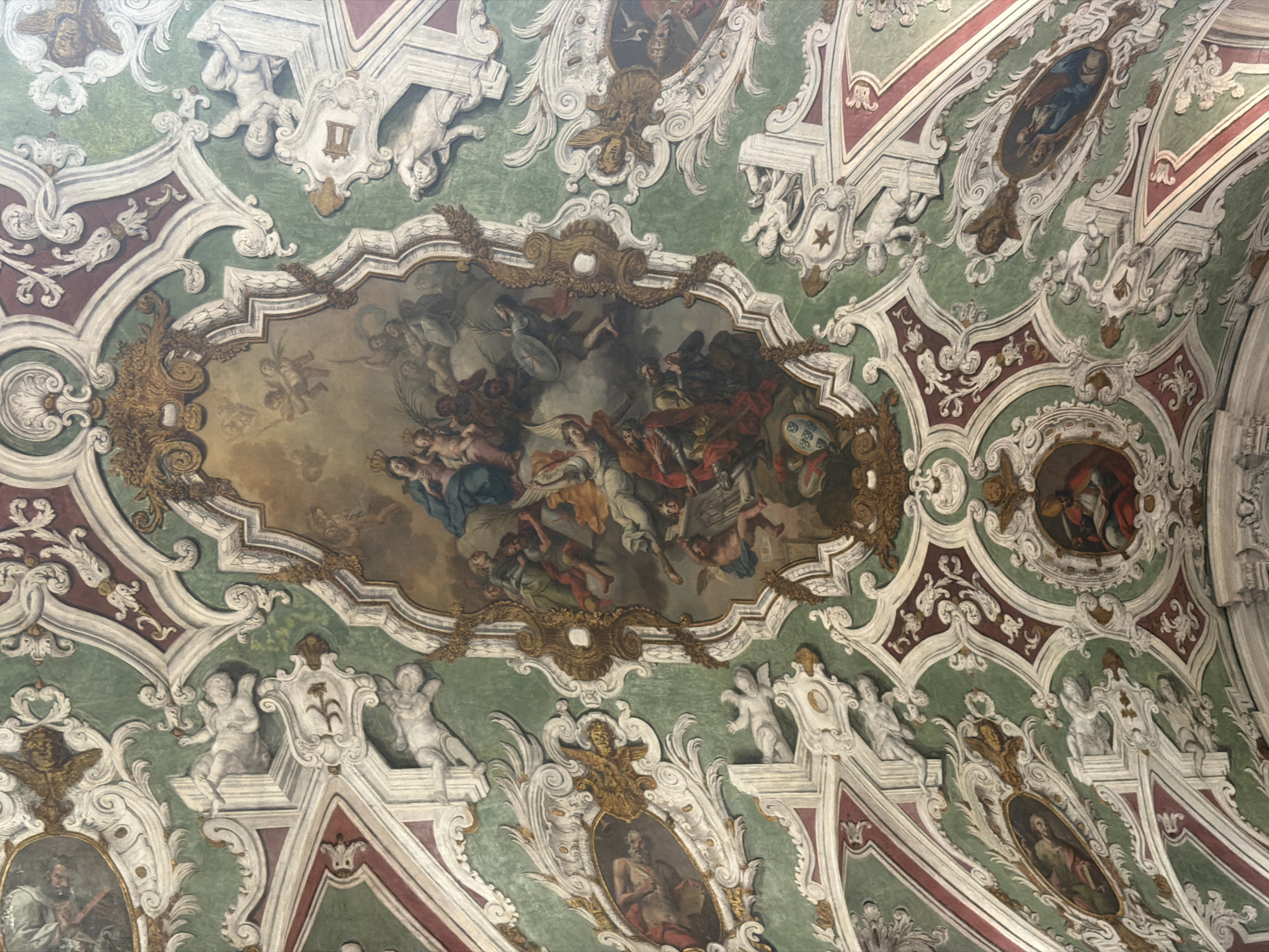 Tourist documents Lisbon's historic architecture and culture during afternoon walk