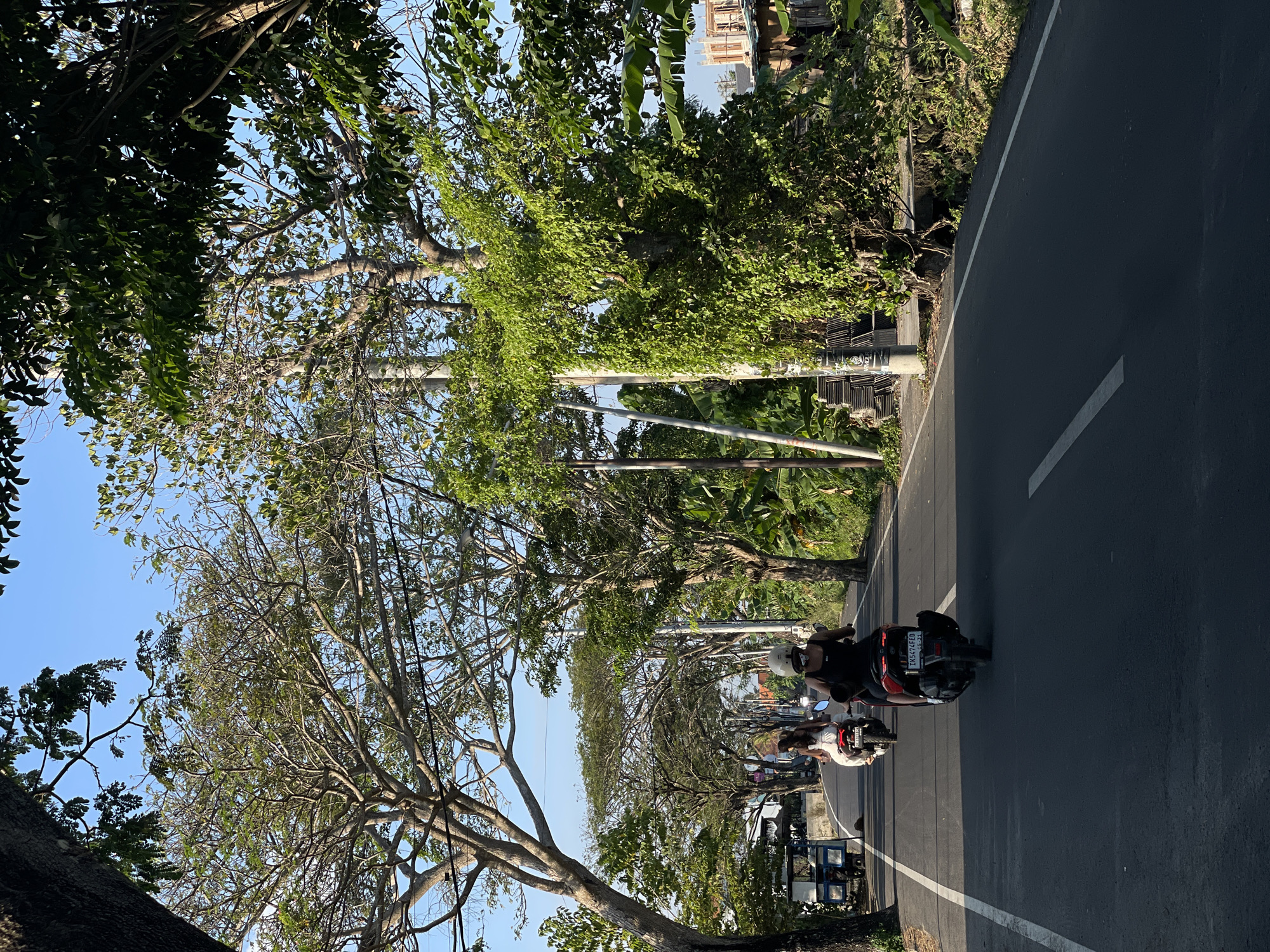 Quiet morning in Mengwi: roads, bikes, and a local cafe