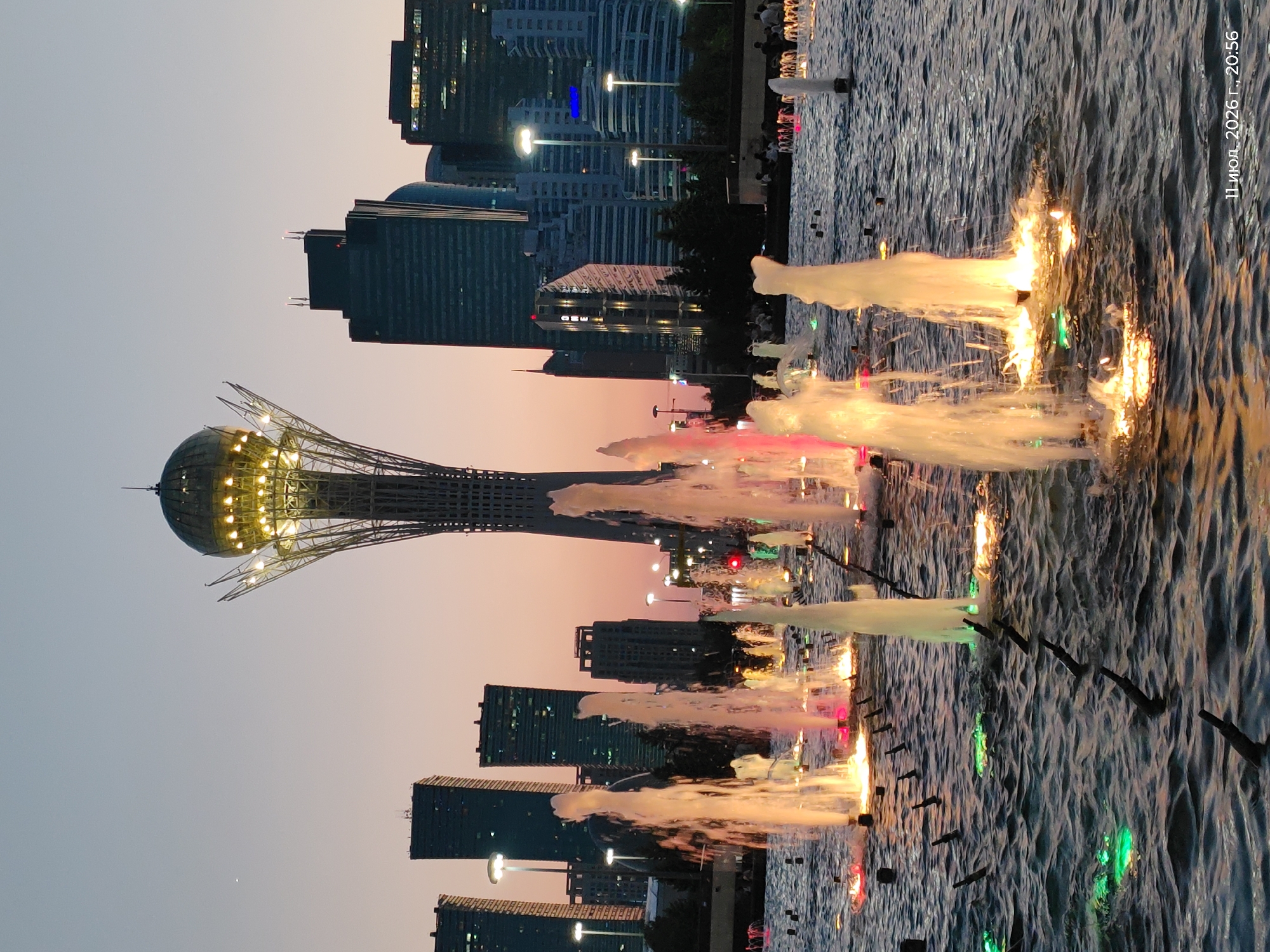 Astana's landmark civic district lit up at night
