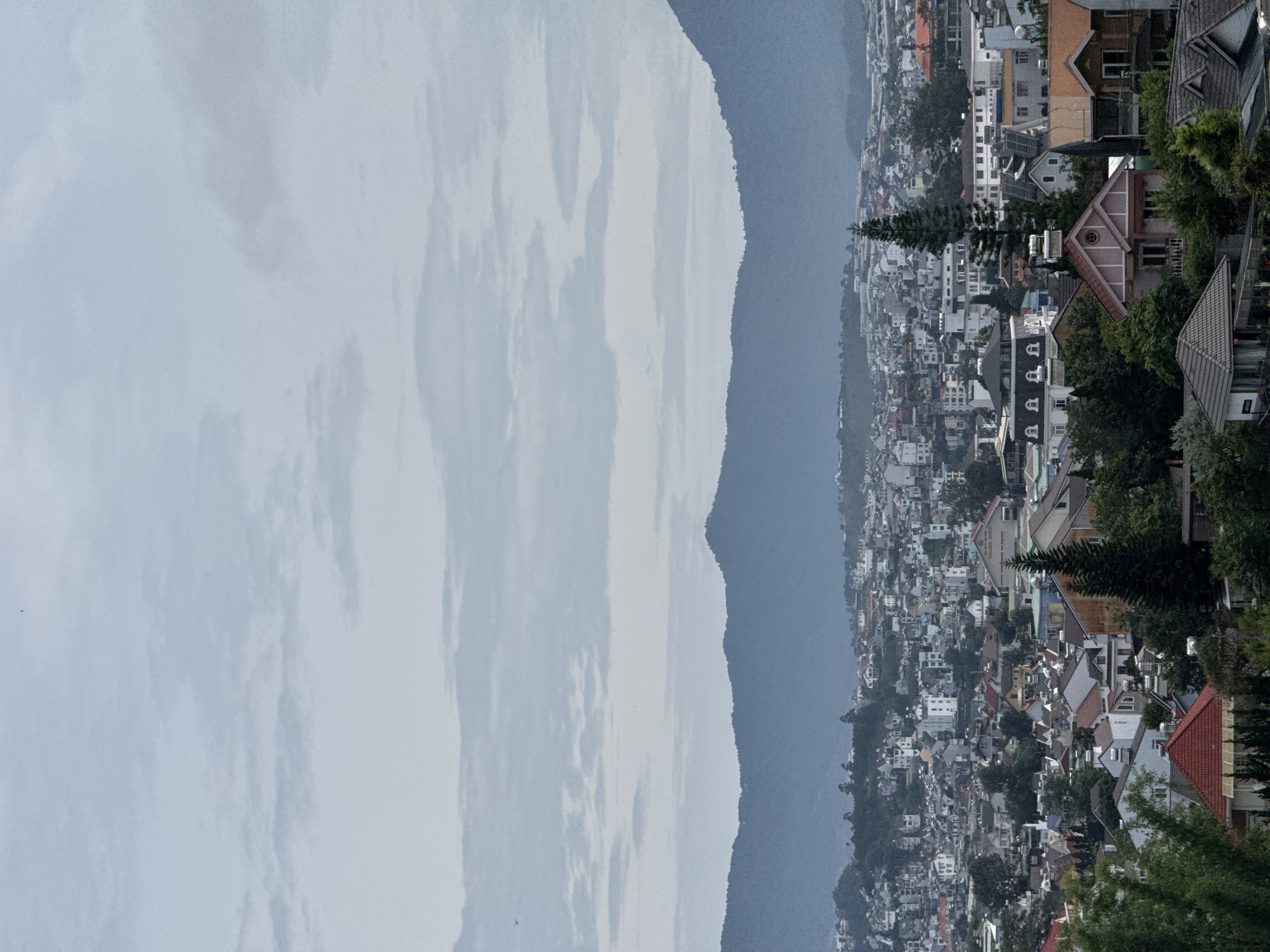 Late-night ride through Da Lat's hilly, wire-strung streets