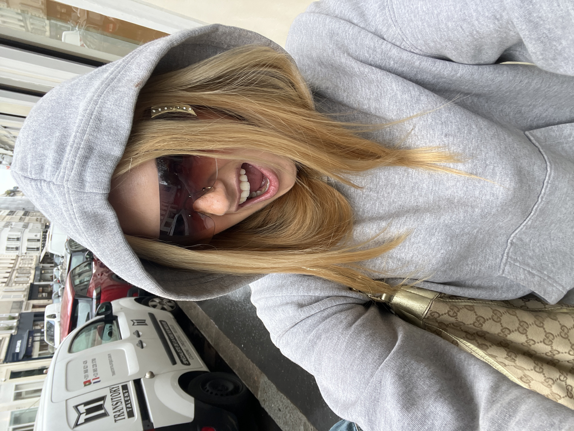 Woman Takes Multiple Selfies Across Paris Locations Within Minutes