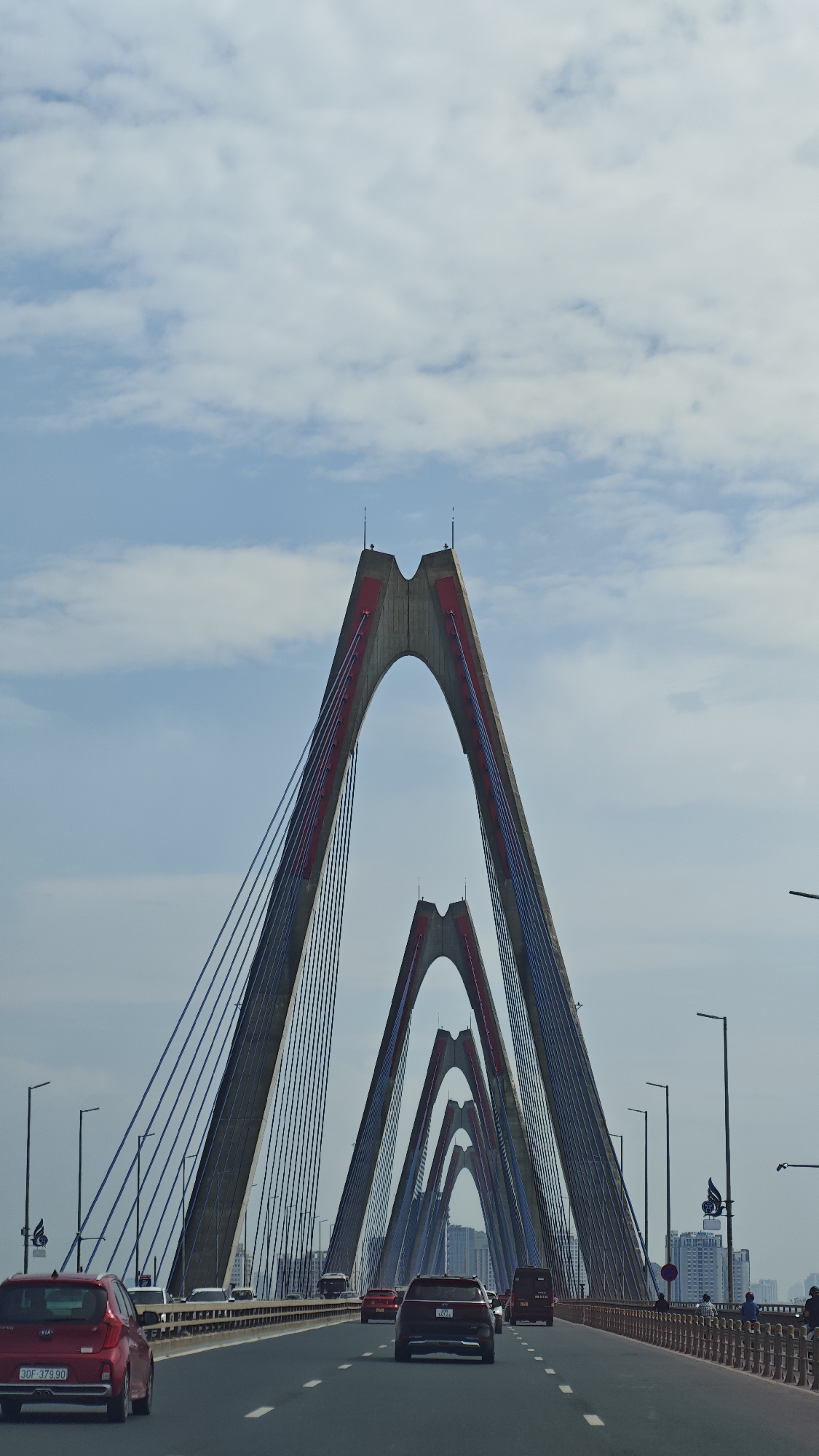 Morning taxi ride across Nhật Tân Bridge in Hanoi