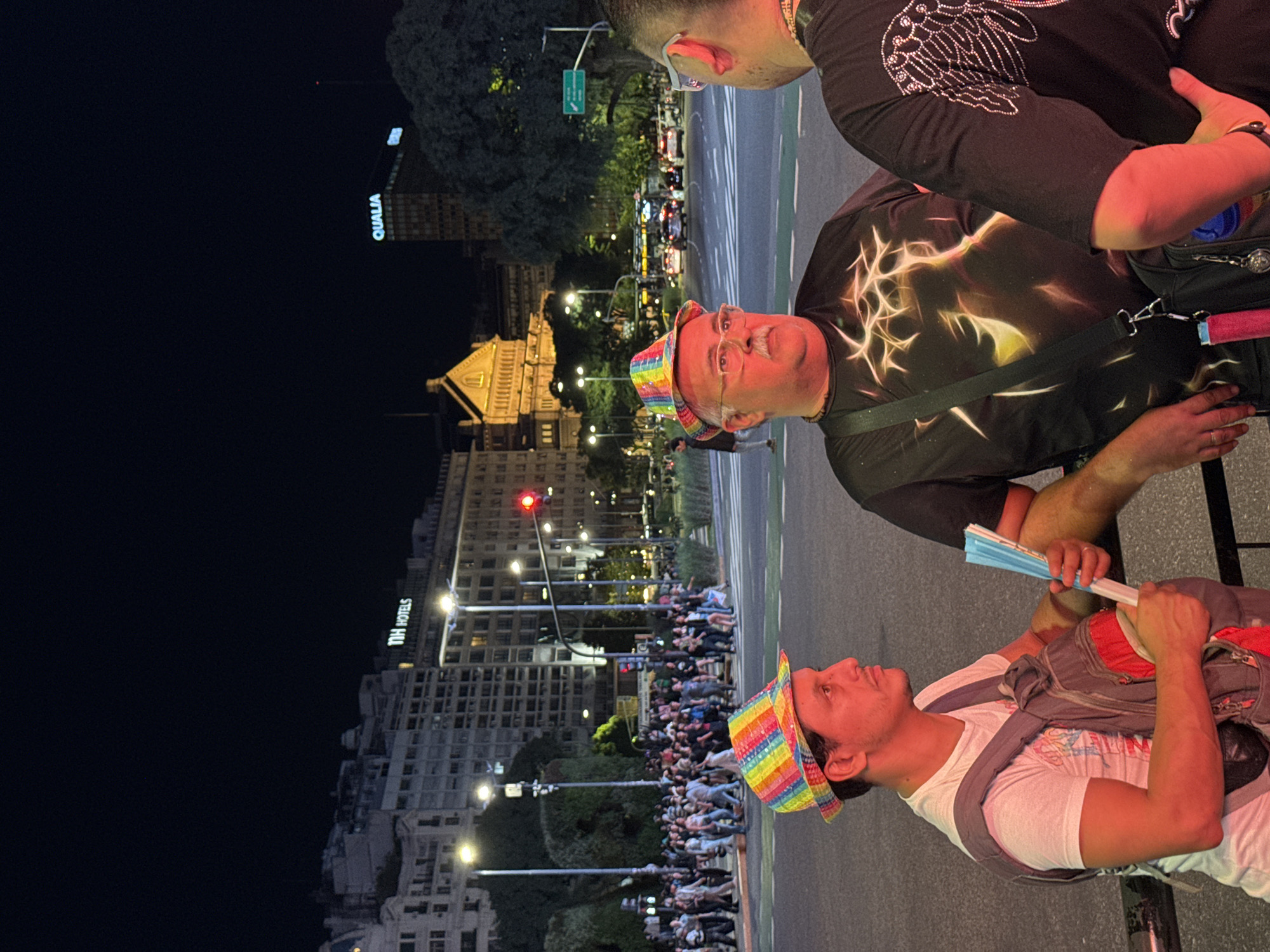 Nighttime crowd gathers near Buenos Aires Obelisco, Spider-Man spotted