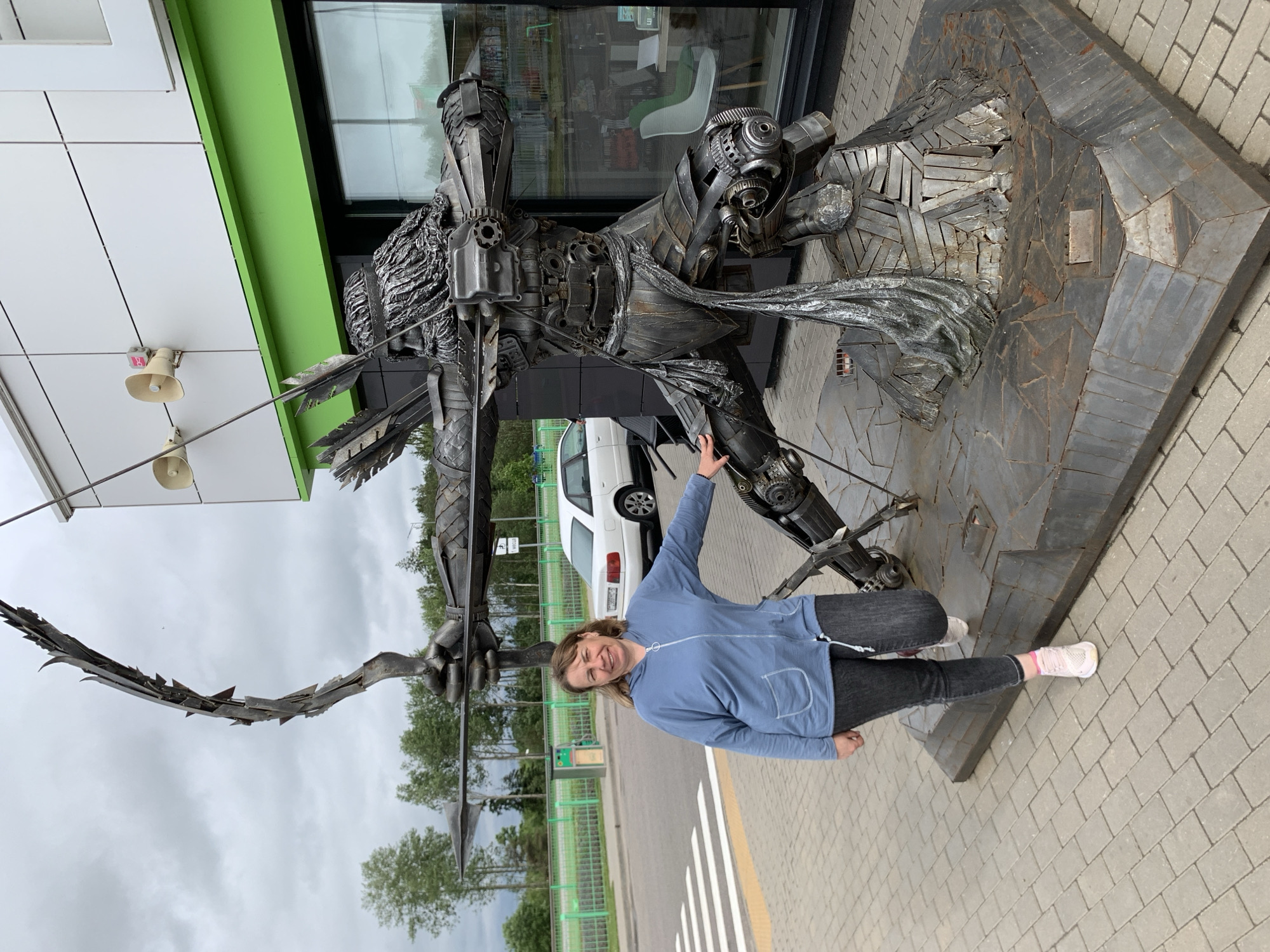 Tourists visit metal archer sculpture in Belarus village