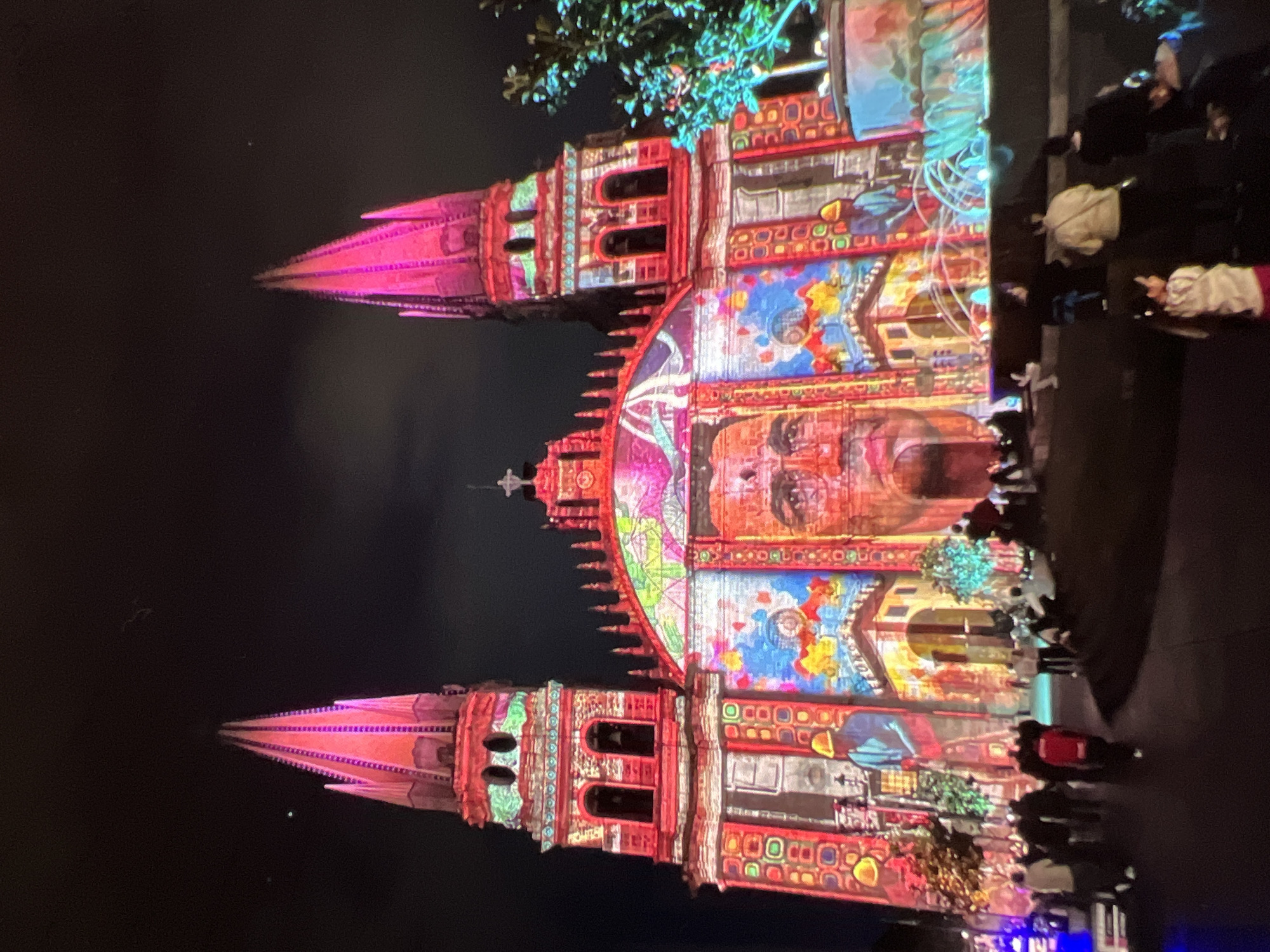 Illuminated historic facades and coastal landscapes at night and day