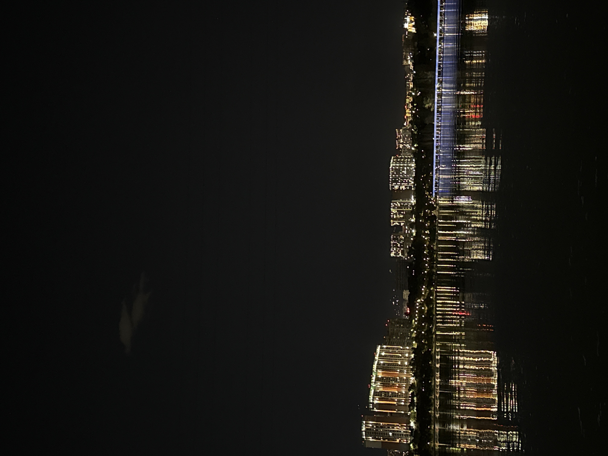 Almaty at night: reflections, a playground, and a cigarette case