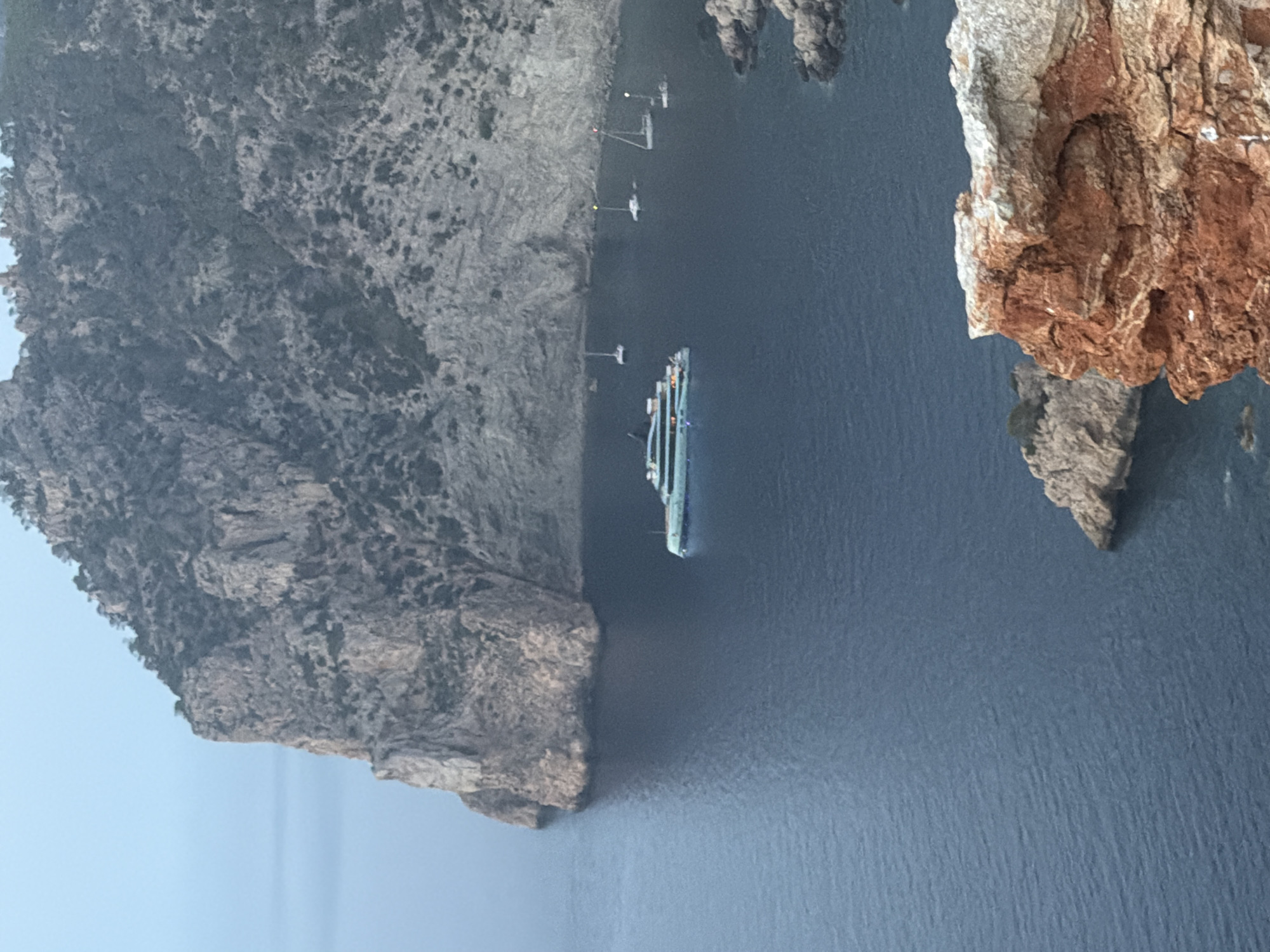 Clifftop sunset toasts on the Ibiza coastline