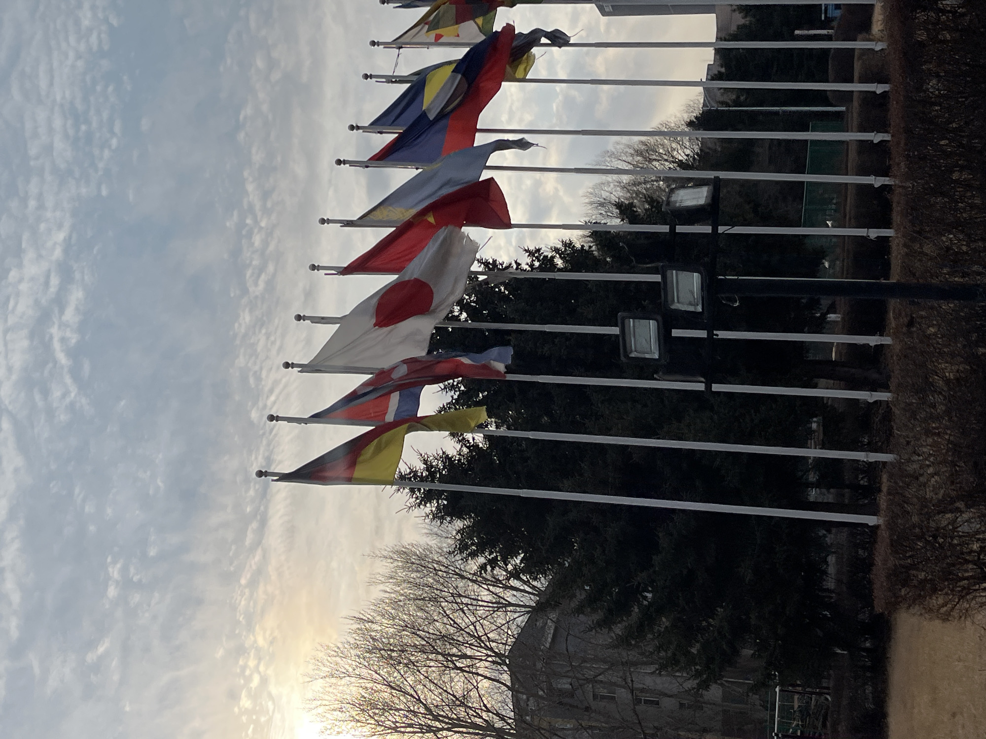 Changchun city scenes show flags, statue, architecture