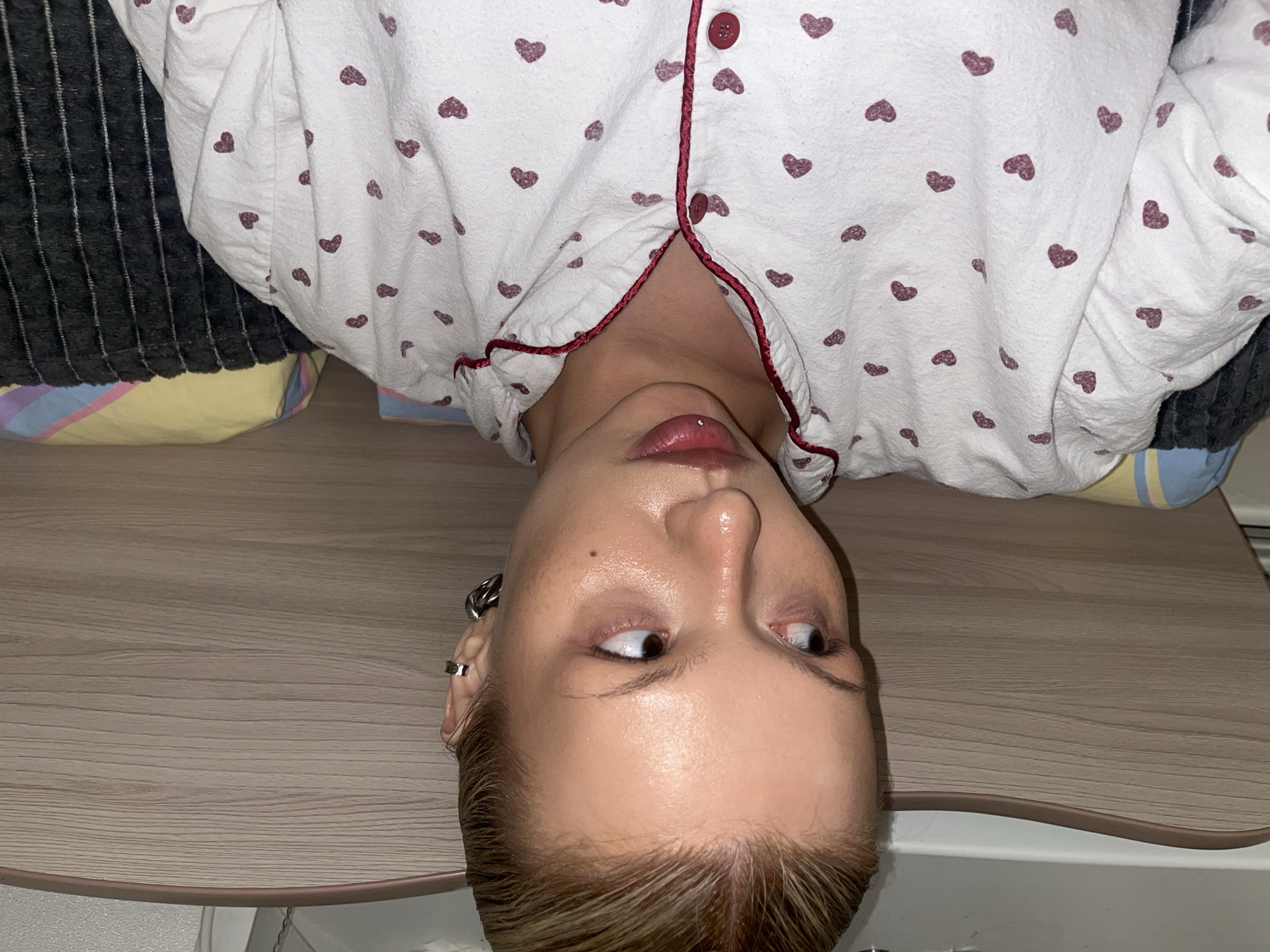 Elderly woman takes selfies around Chaikovsky apartment building