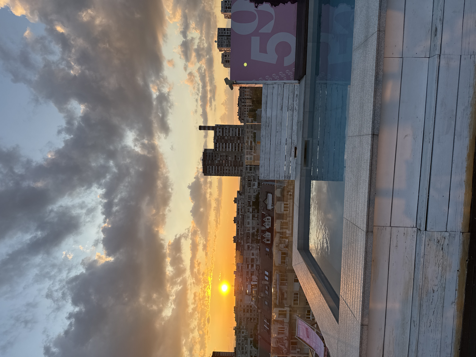 Sofia rooftop pool captures sunset panorama over Bulgarian capital