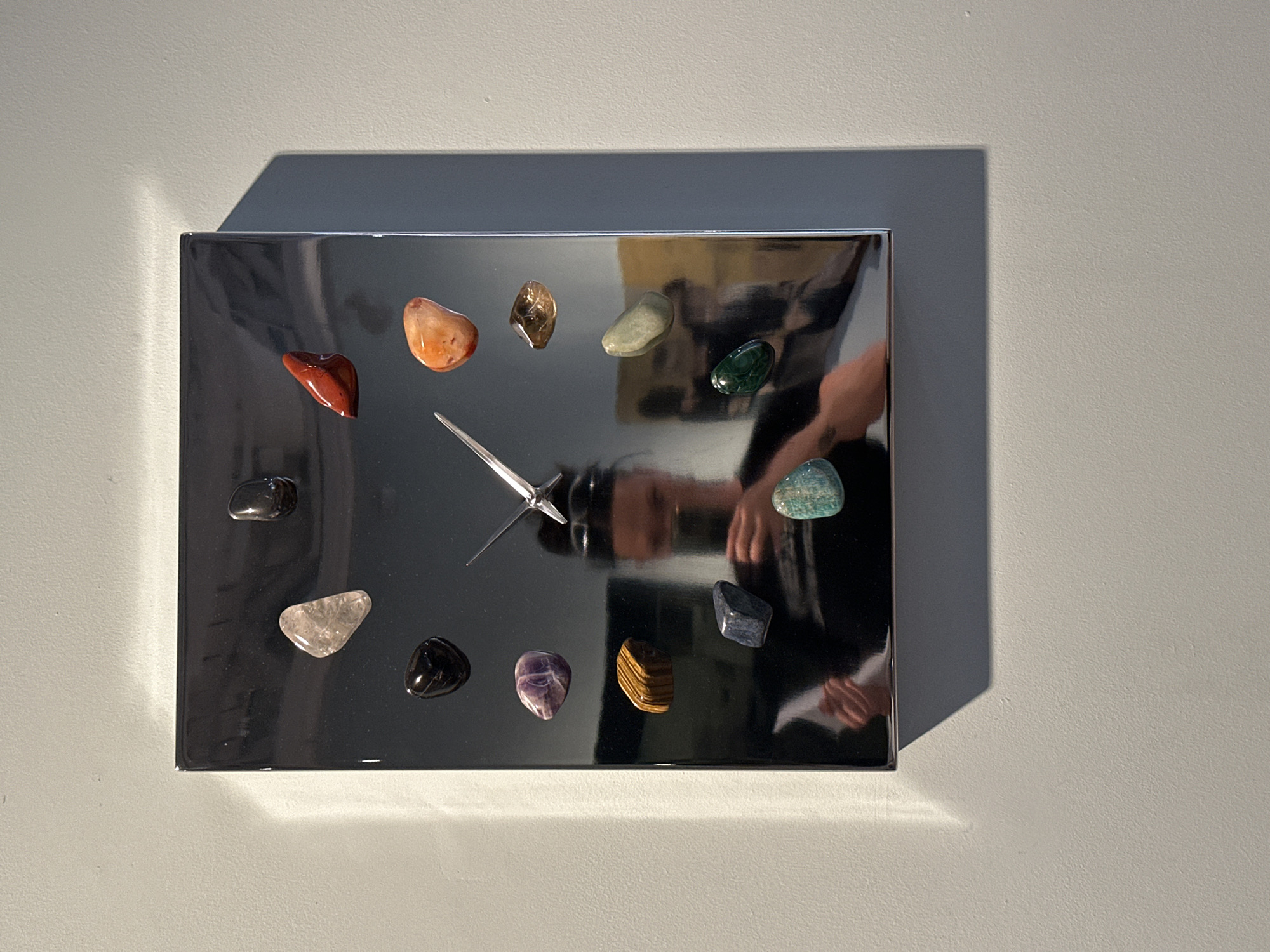 Art gallery visitors document diverse installations in London exhibition space