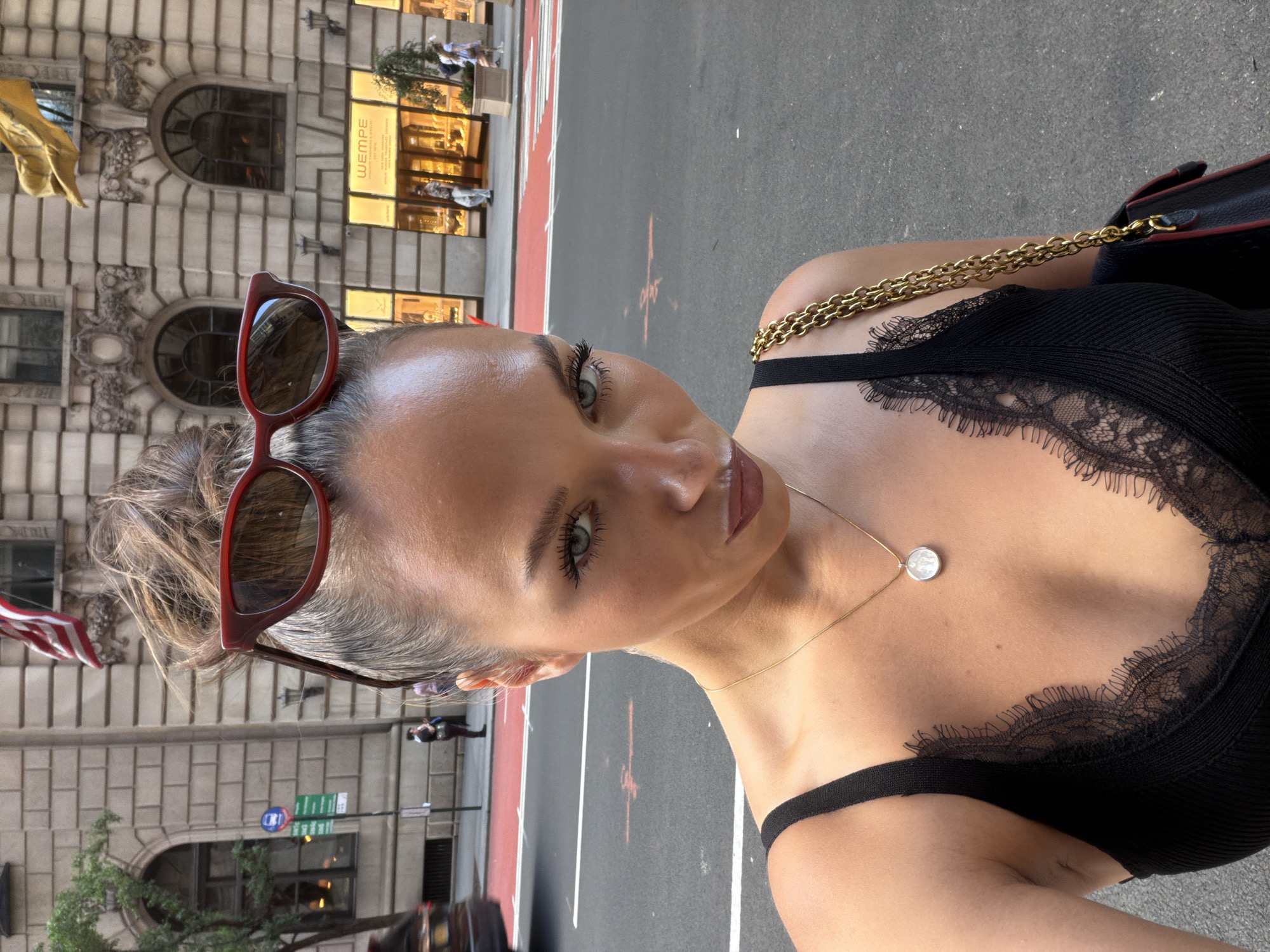 Woman takes selfie on NYC street intersection Sunday evening
