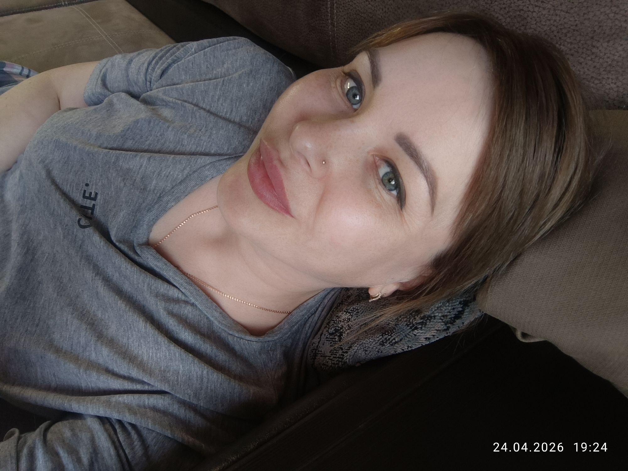 Woman relaxes at home with plants in Chaikovsky