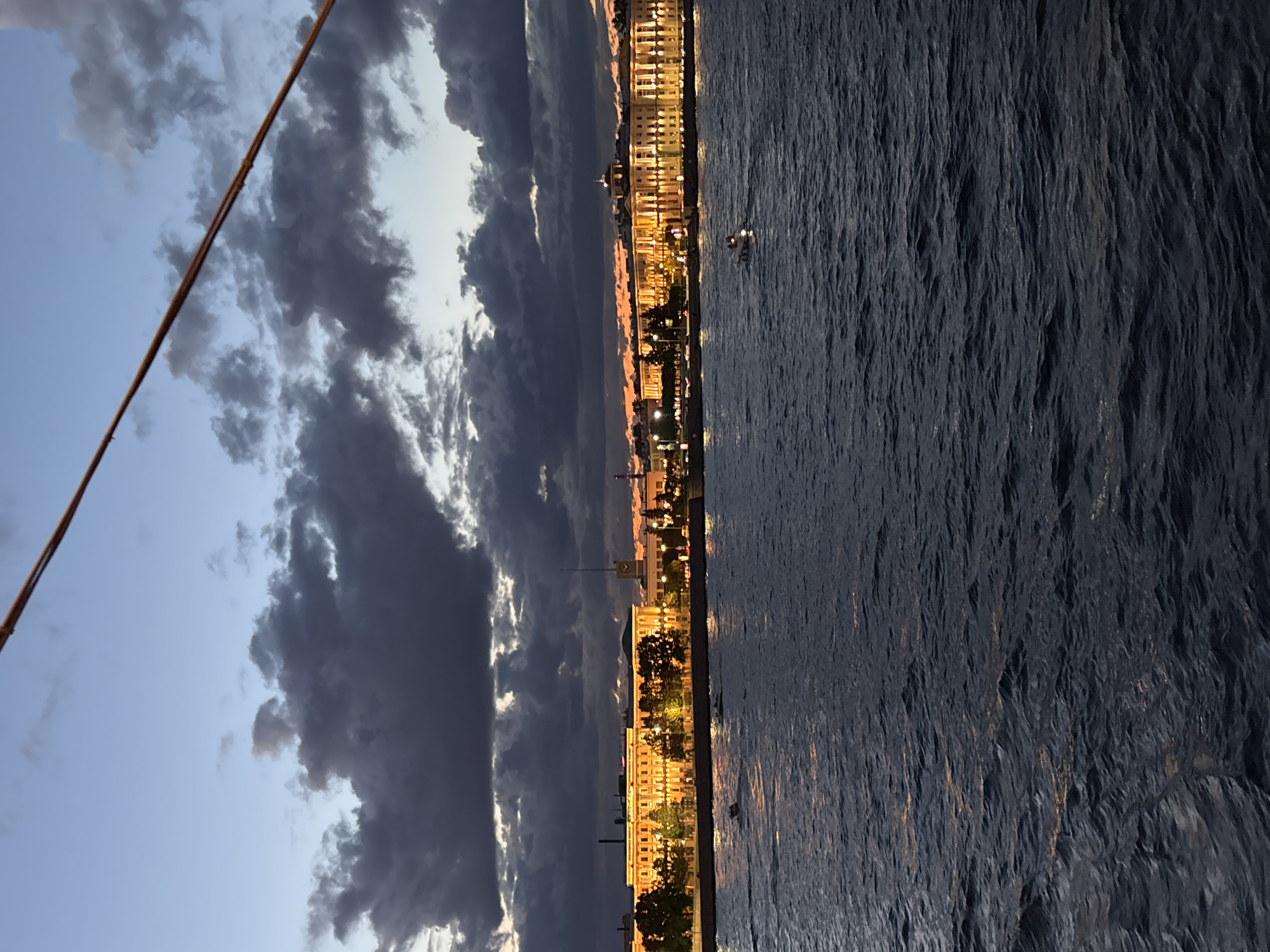 Saint Petersburg's drawbridges rise over the Neva at dusk