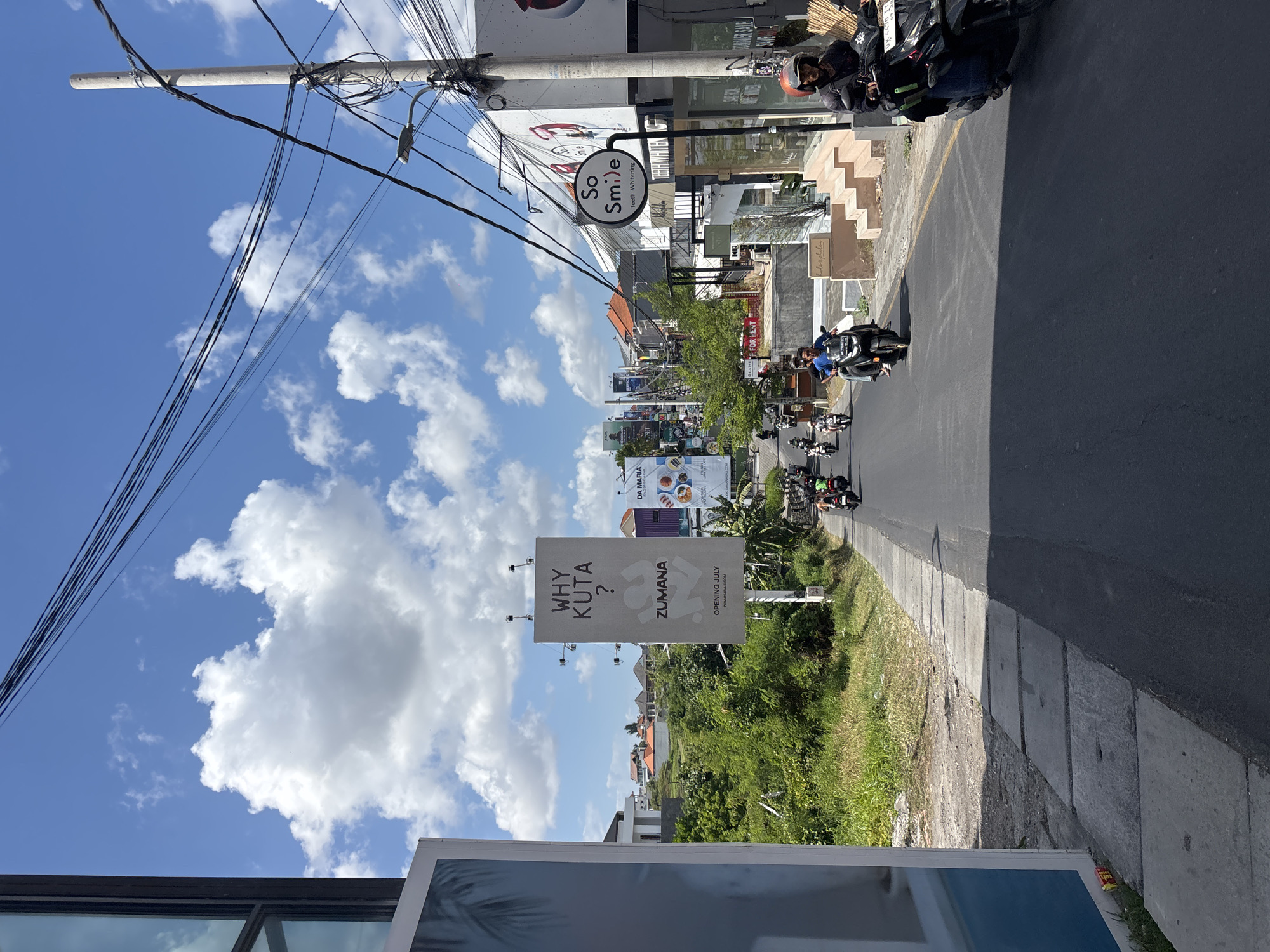 Street life along North Kuta's Canggu strip on a July morning