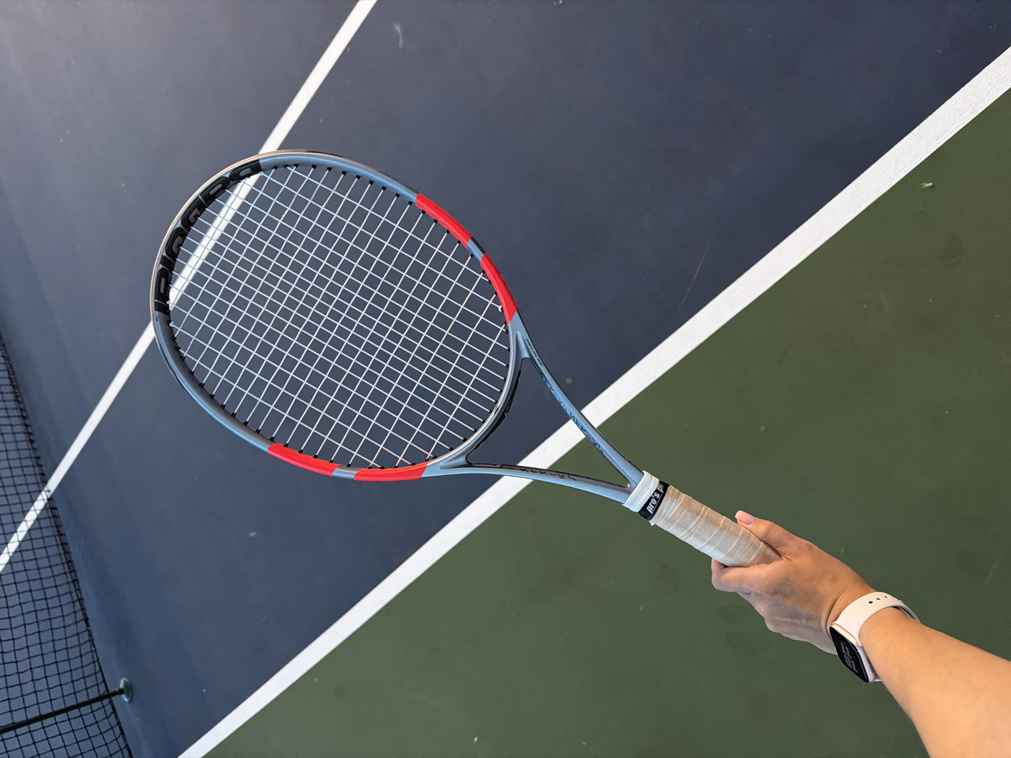 Tennis session captured at indoor court in Podolsk, Russia