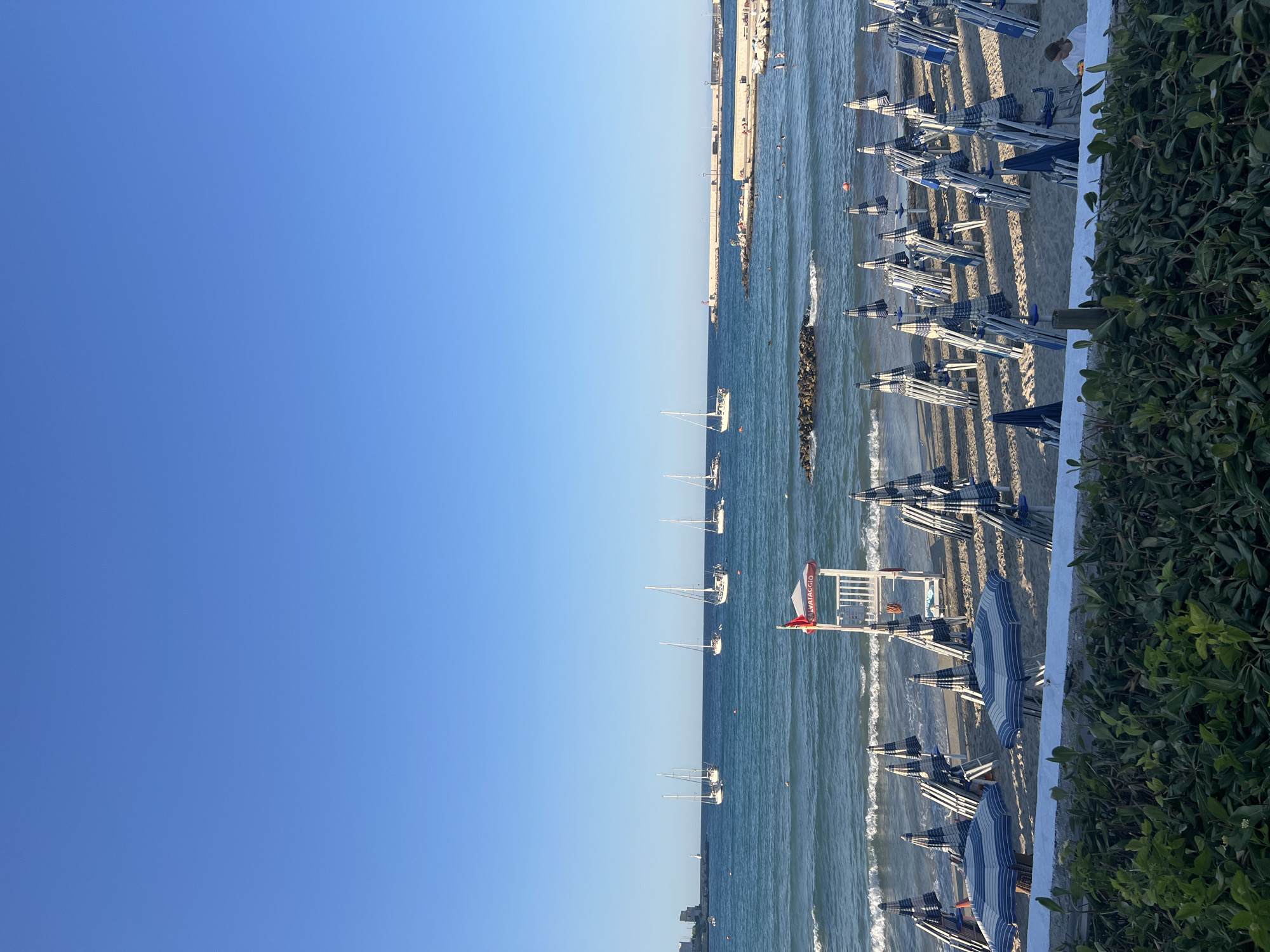 Sunny afternoon at Otranto's beach and waterfront