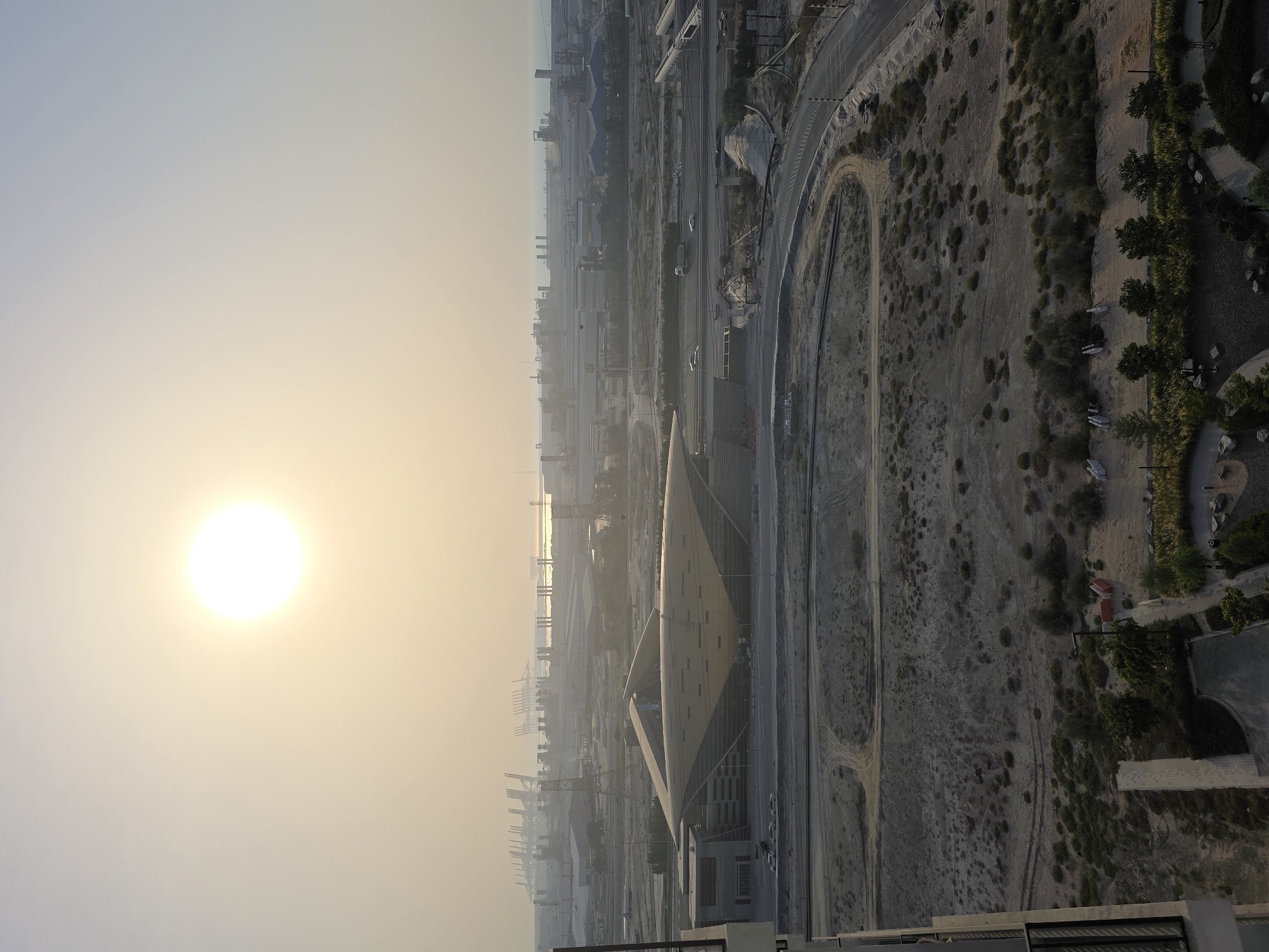 Coffee and skyline views over Dubai at golden hour
