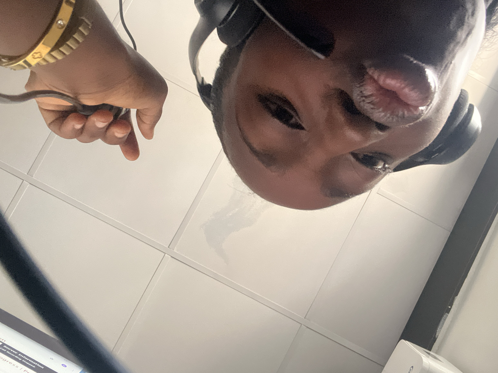 Person with headphones photographed multiple times in Karum, Nigeria