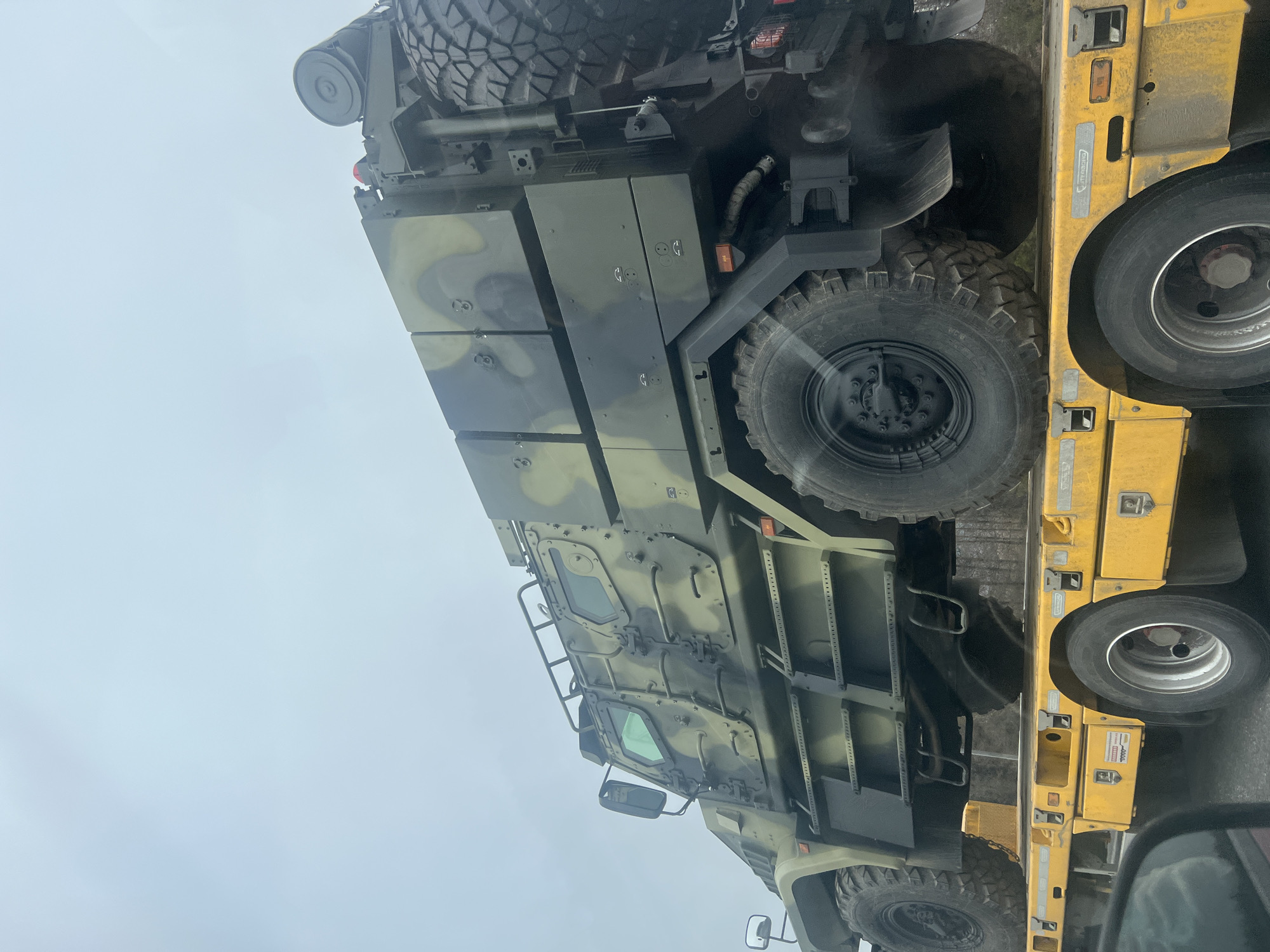 Military vehicle transported on trailer in Kazyli, Russia