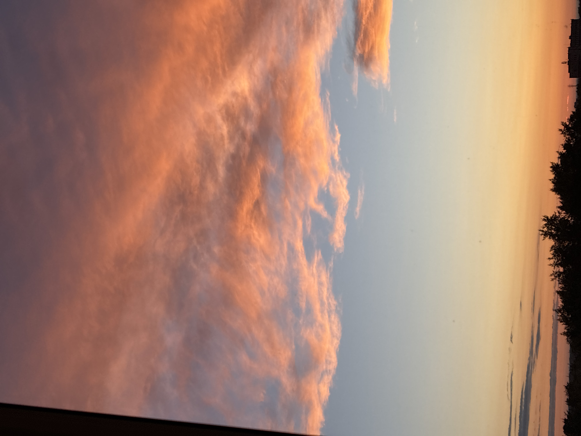 City sunset documented from multiple angles, June solstice evening