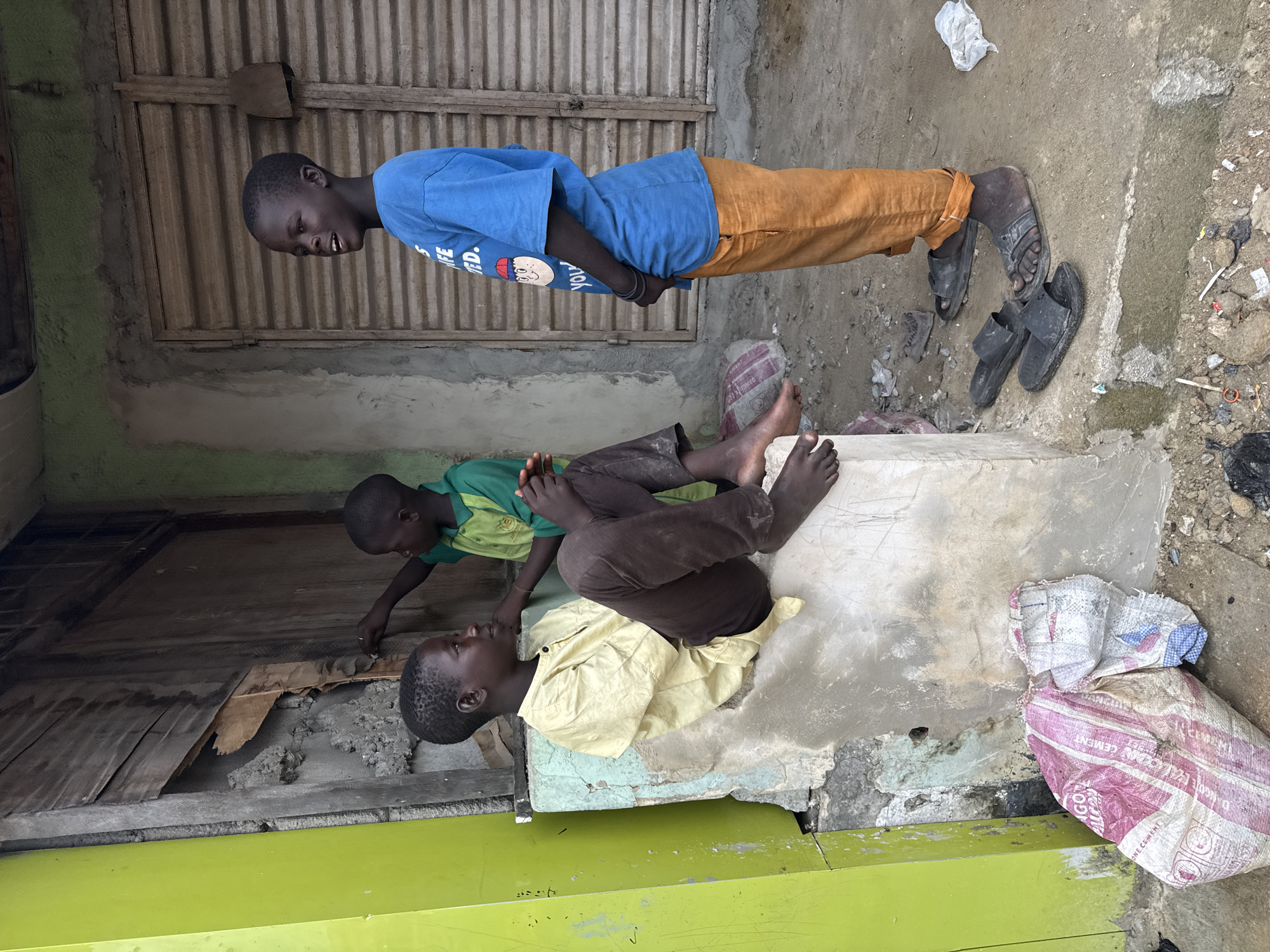 Everyday street life across three Nigerian towns after rain