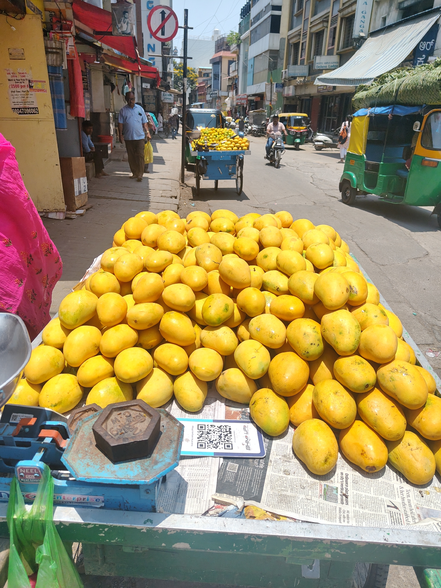 Morning street vendors sell mangoes, religious items in Bengaluru