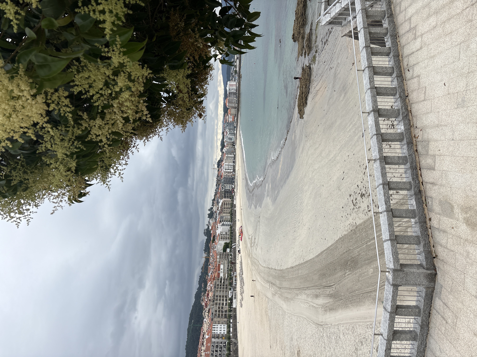 Sanxenxo beach and port on a cloudy July morning