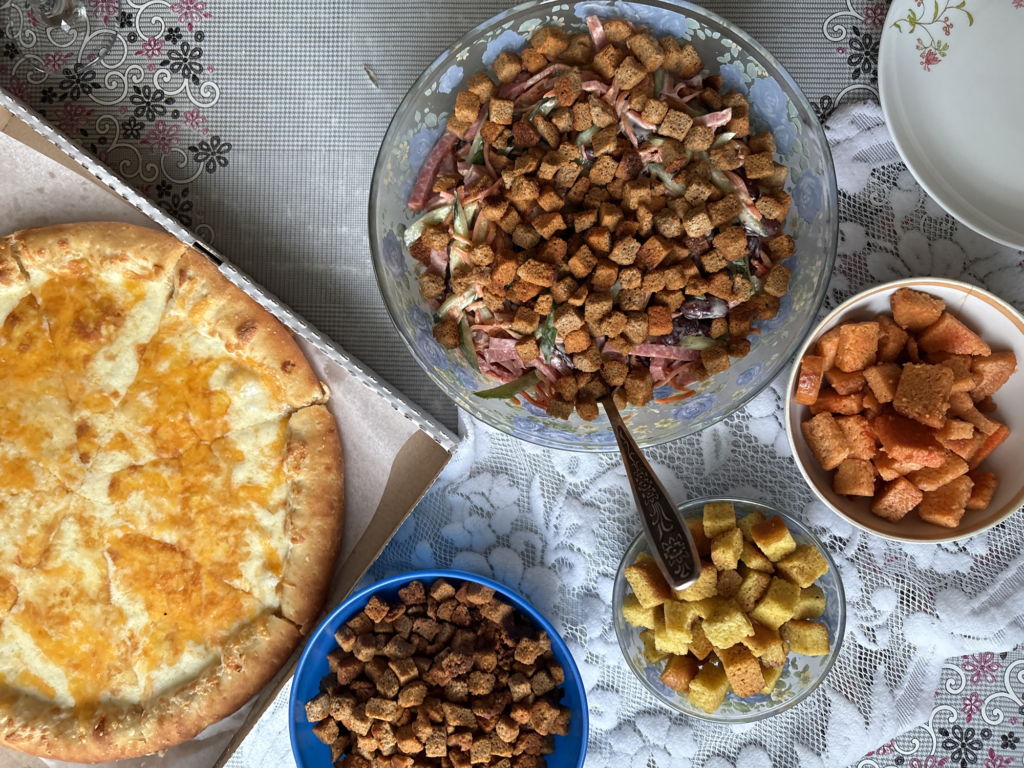 Meal documented with pizza, salad, beer in Ust-Ilimsk