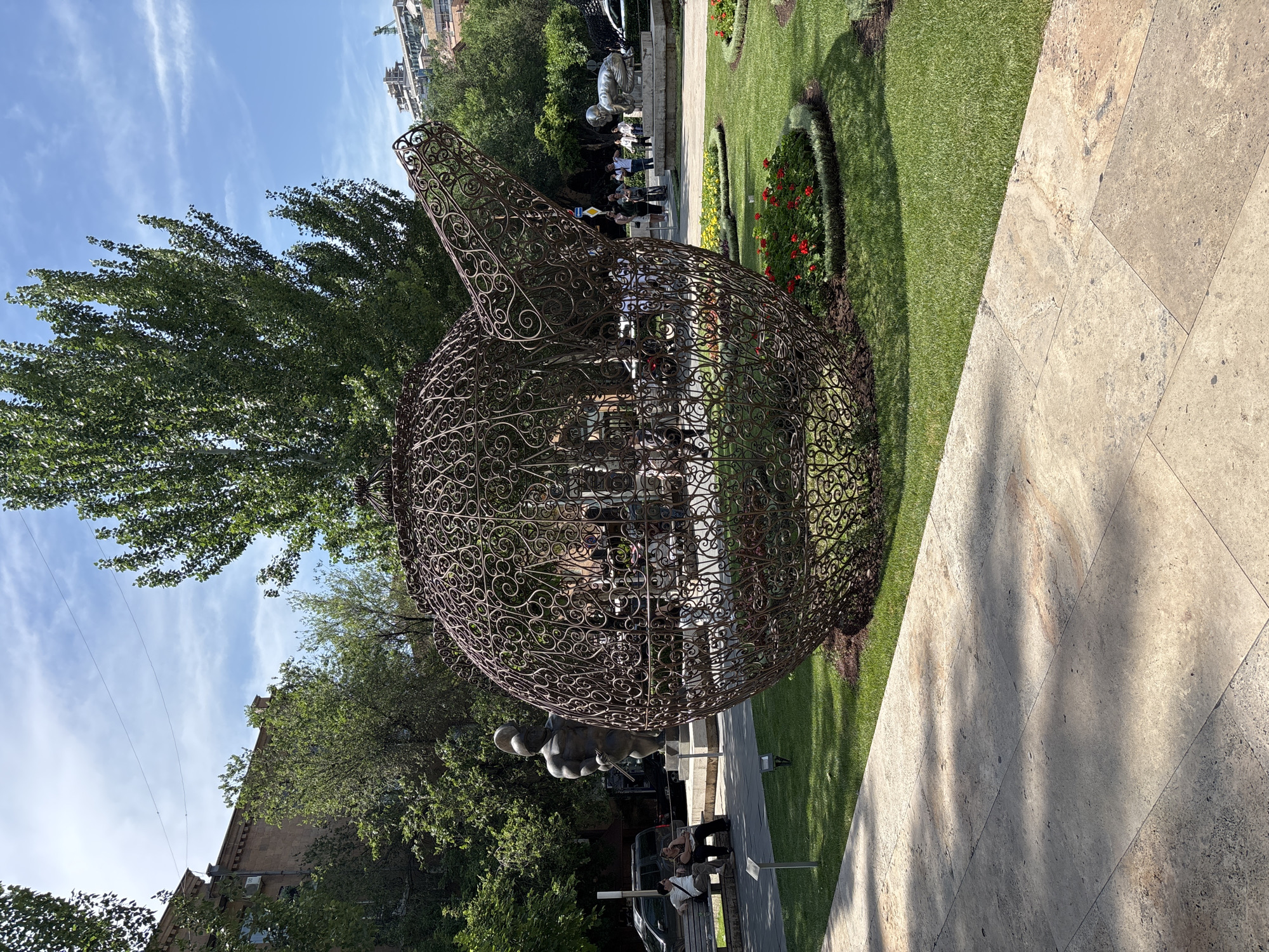 Tourist documents sculptures and fountains at Yerevan's Cascade complex