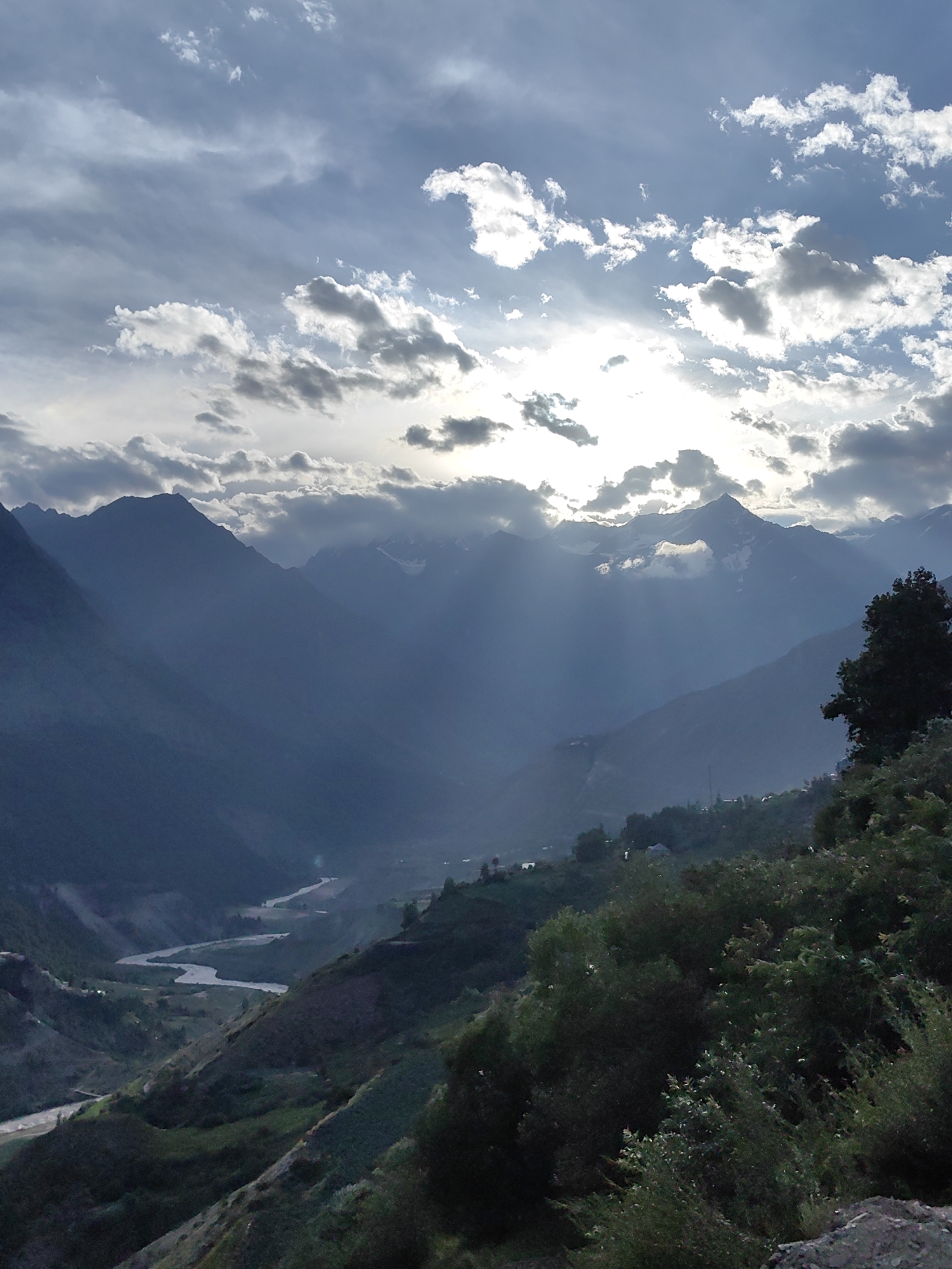 Stormy skies and churning rivers in Tiling's mountain terrain