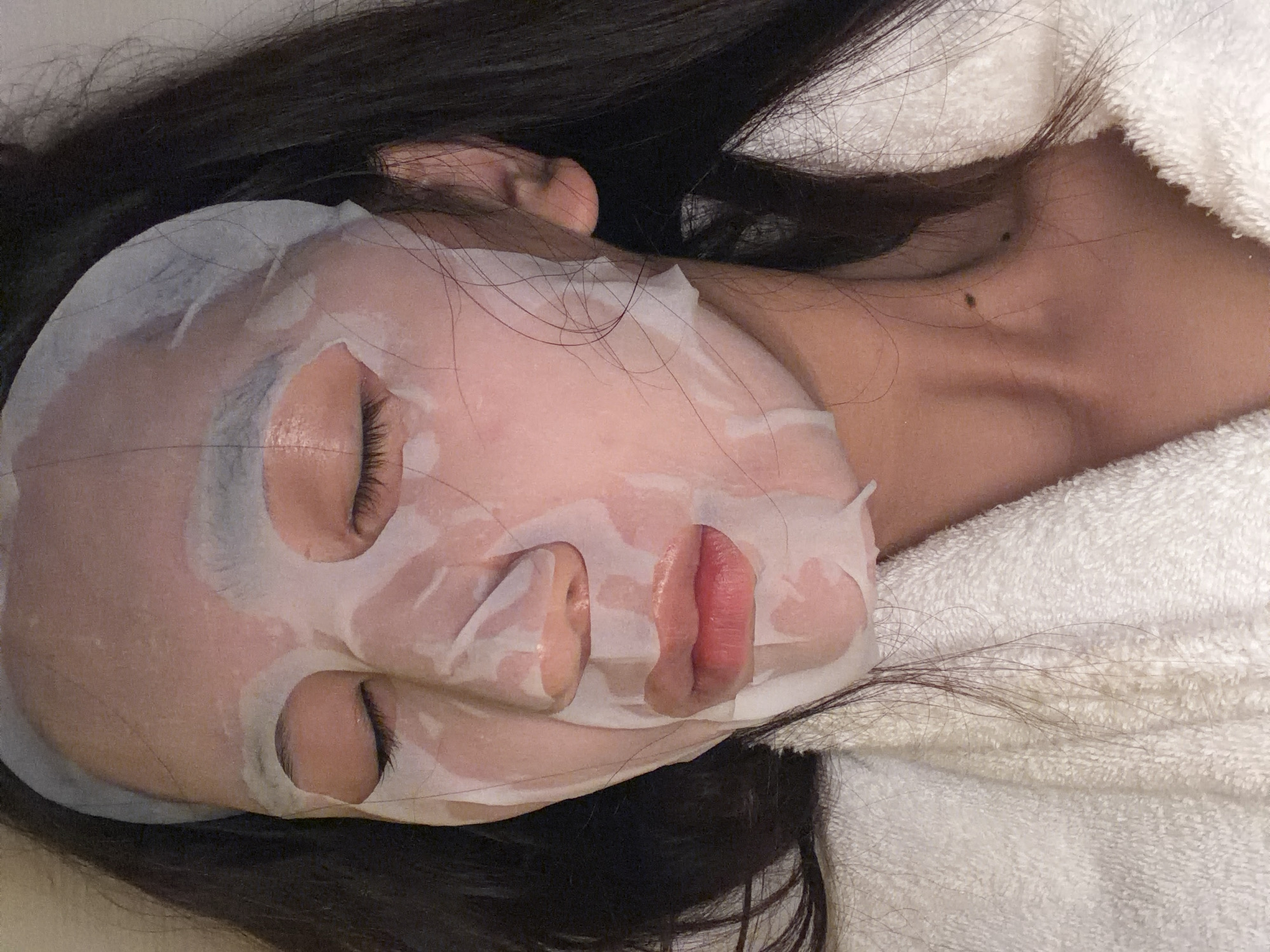 Person applies facial mask in French Riviera town
