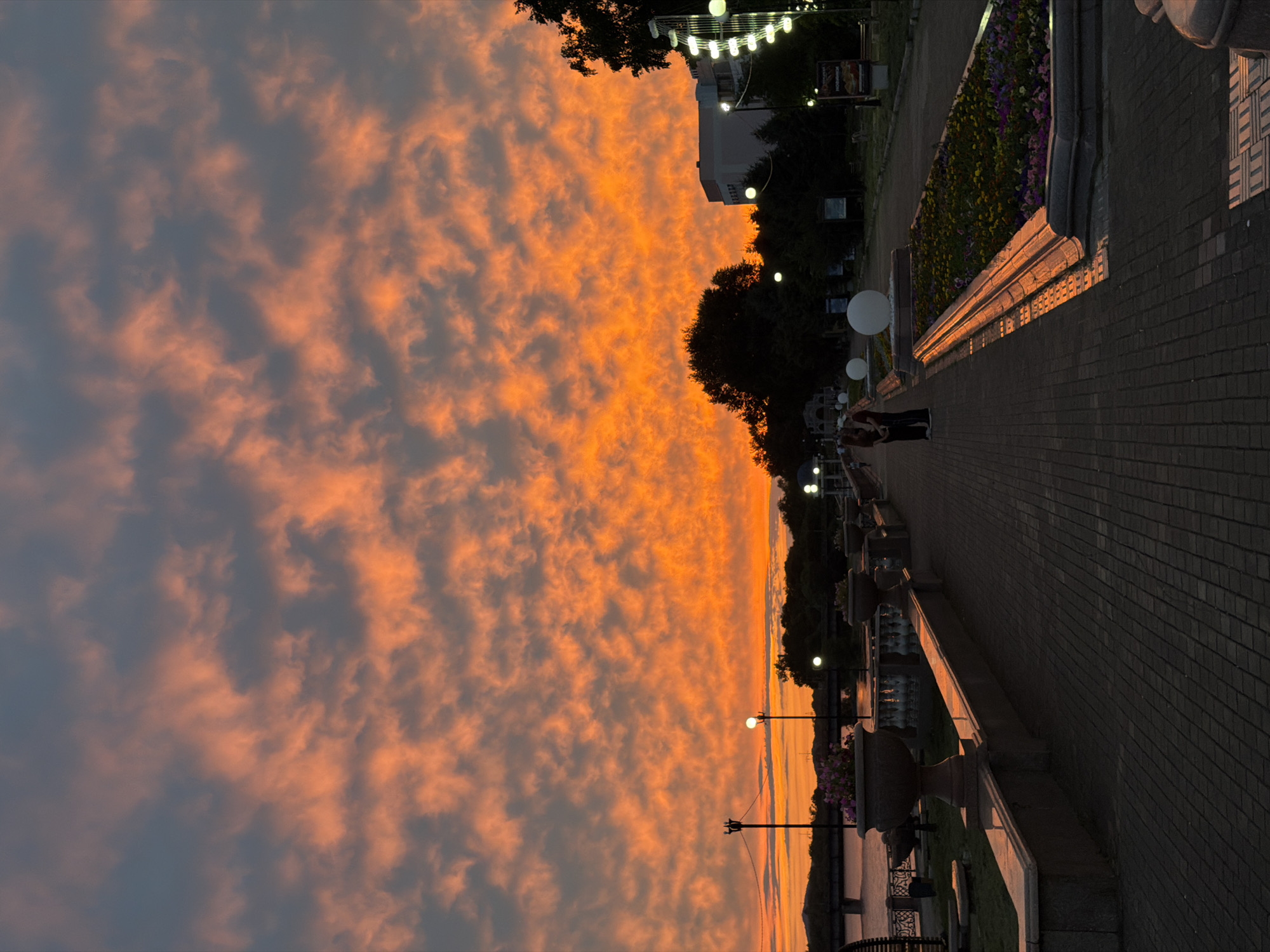 Sunset over Birobidzhan's waterfront promenade